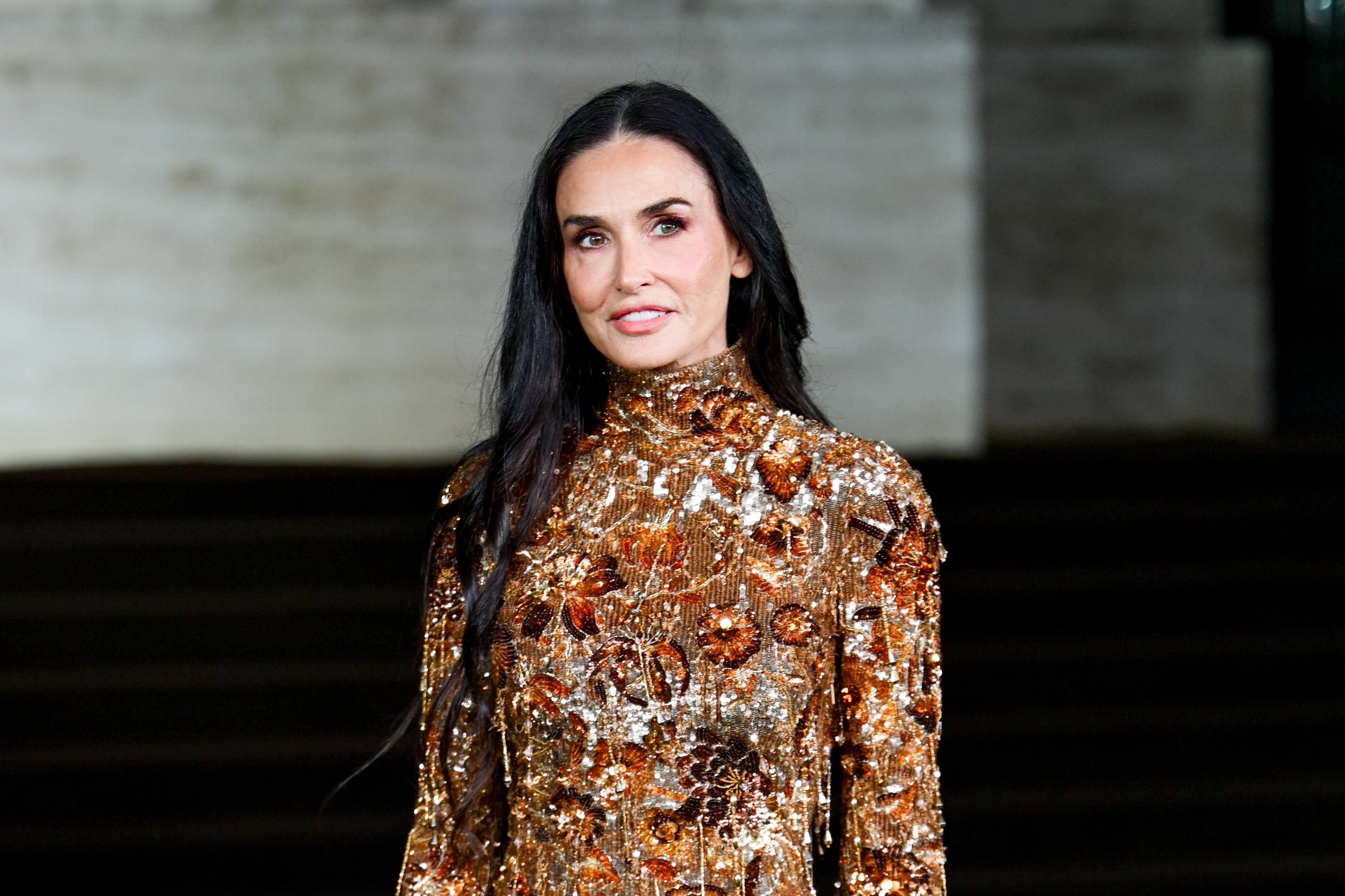 Demi Moore attends the Gucci fashion show as part of Spring/Summer 2026 Milan Fashion Week held at Palazzo Mezzanotte on September 23, 2025, in Milan, Italy. | Source: Getty Images