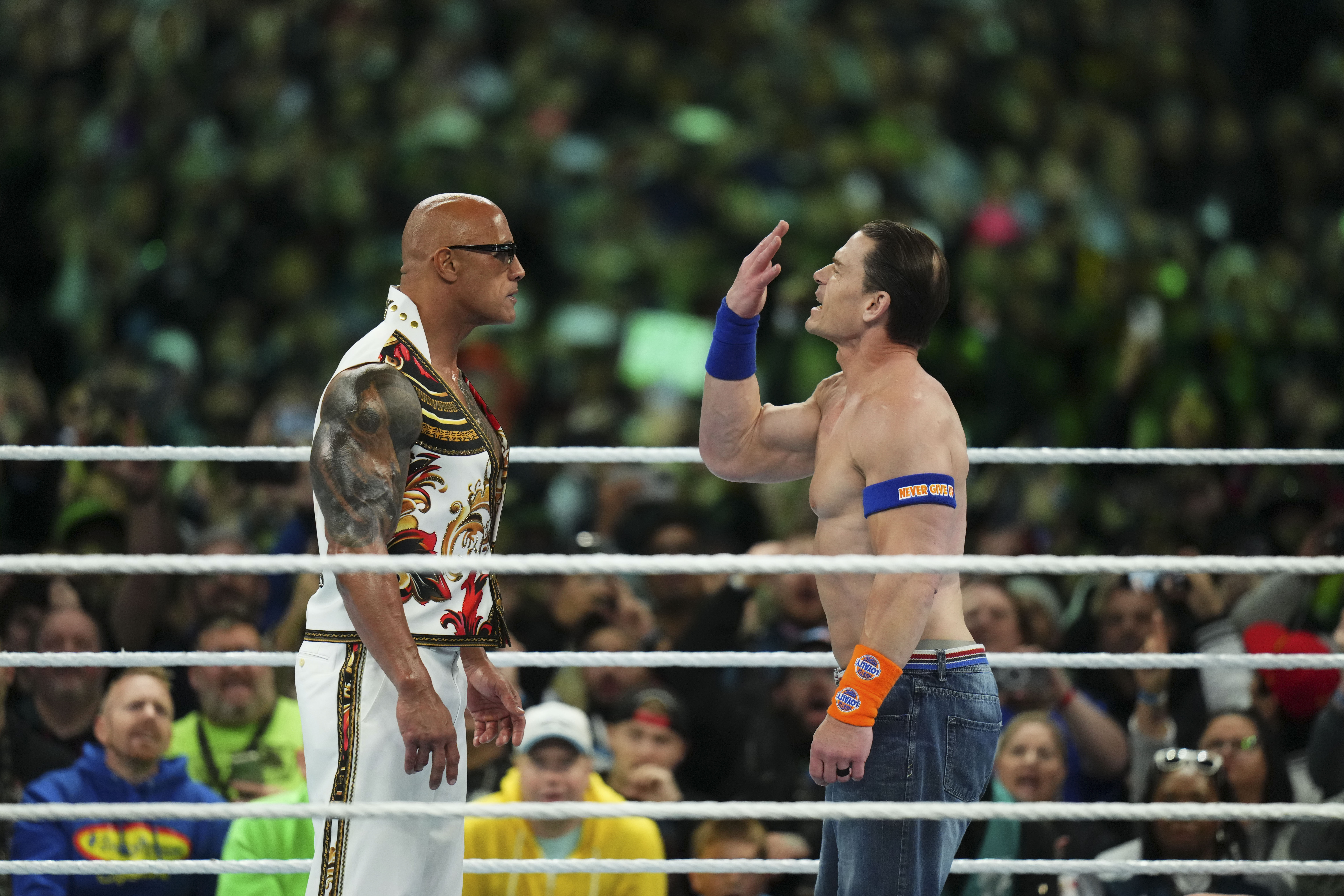 The Rock fights against John Cena on Night Two at WrestleMania 40 at Lincoln Financial Field on April 7, 2024, in Philadelphia, Pennsylvania. | Source: Getty Images
