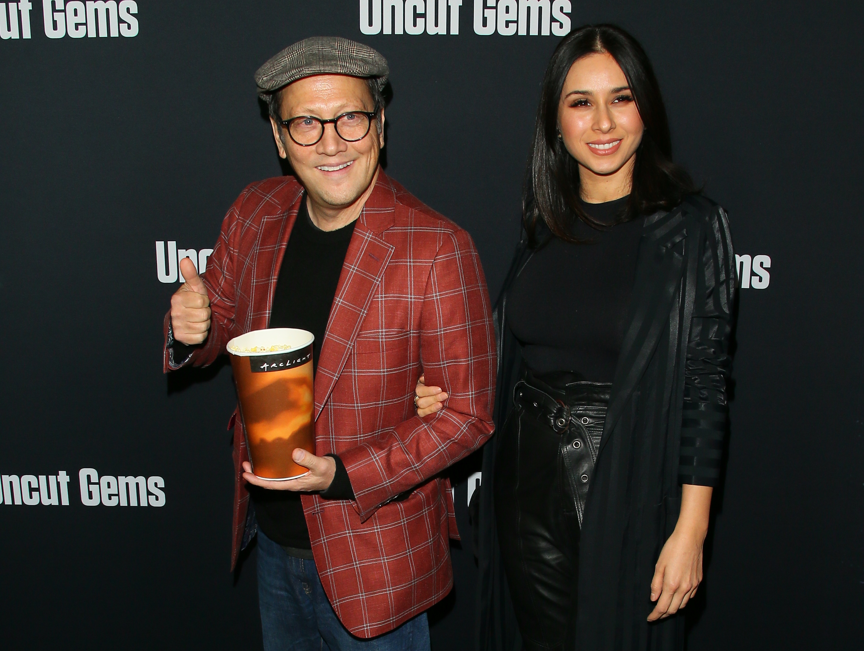Rob Schneider and Patricia Azarcoya Schneider attend the premiere of A24's "Uncut Gems" at The Dome at Arclight Hollywood on December 11, 2019 in Hollywood, California. | Source: Getty Images
