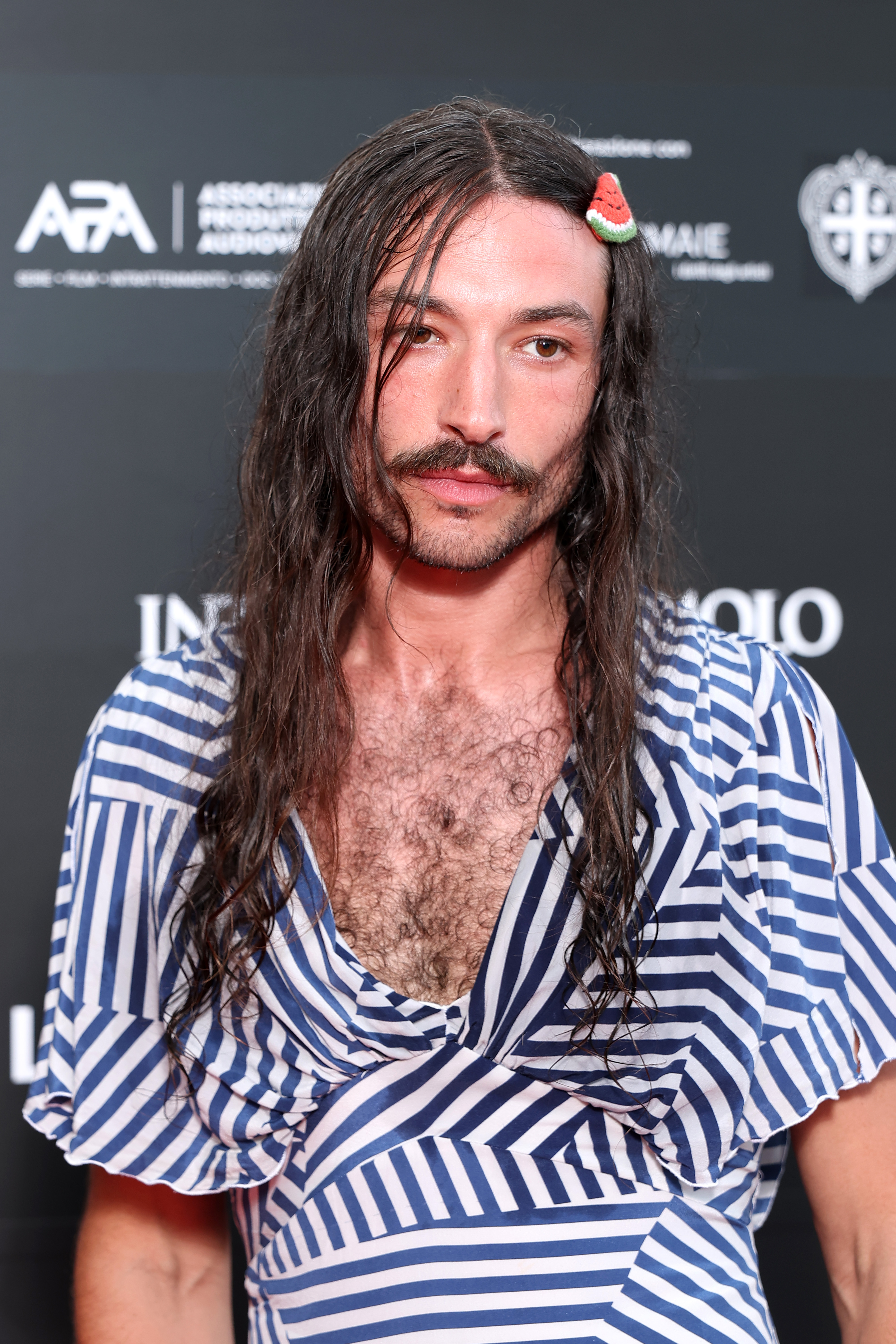 Ezra Miller attends the Filming Italy 2025 red carpet at Forte Village Resort on June 21, 2025, in Santa Margherita di Pula, Italy. | Source: Getty Images