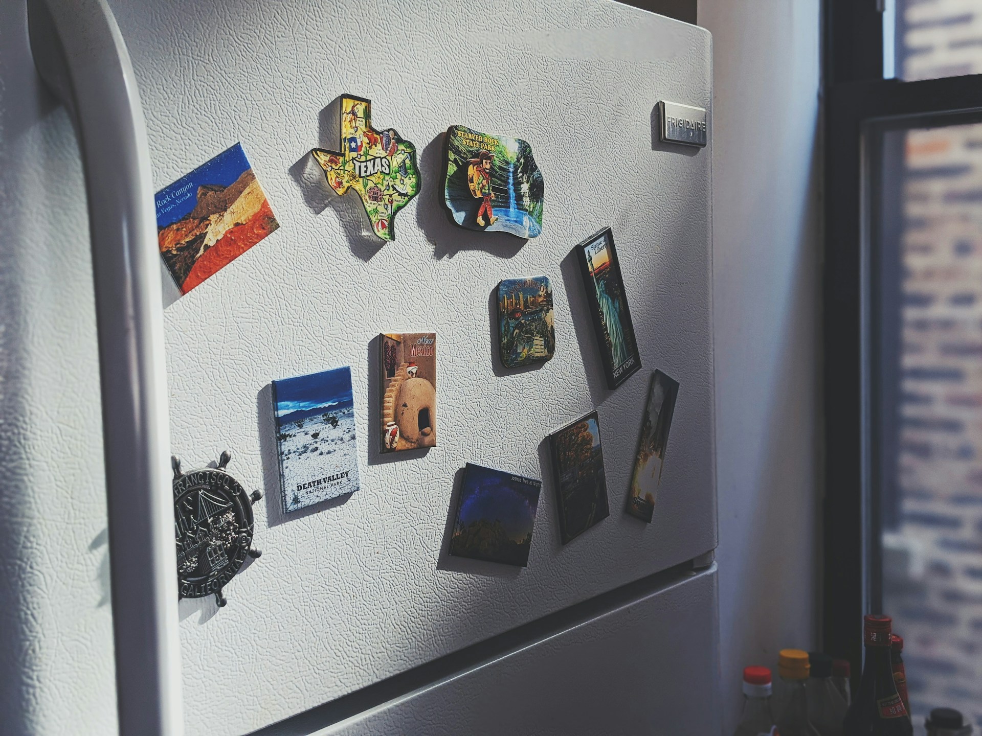 Magnets on a refrigerator | Source: Unsplash