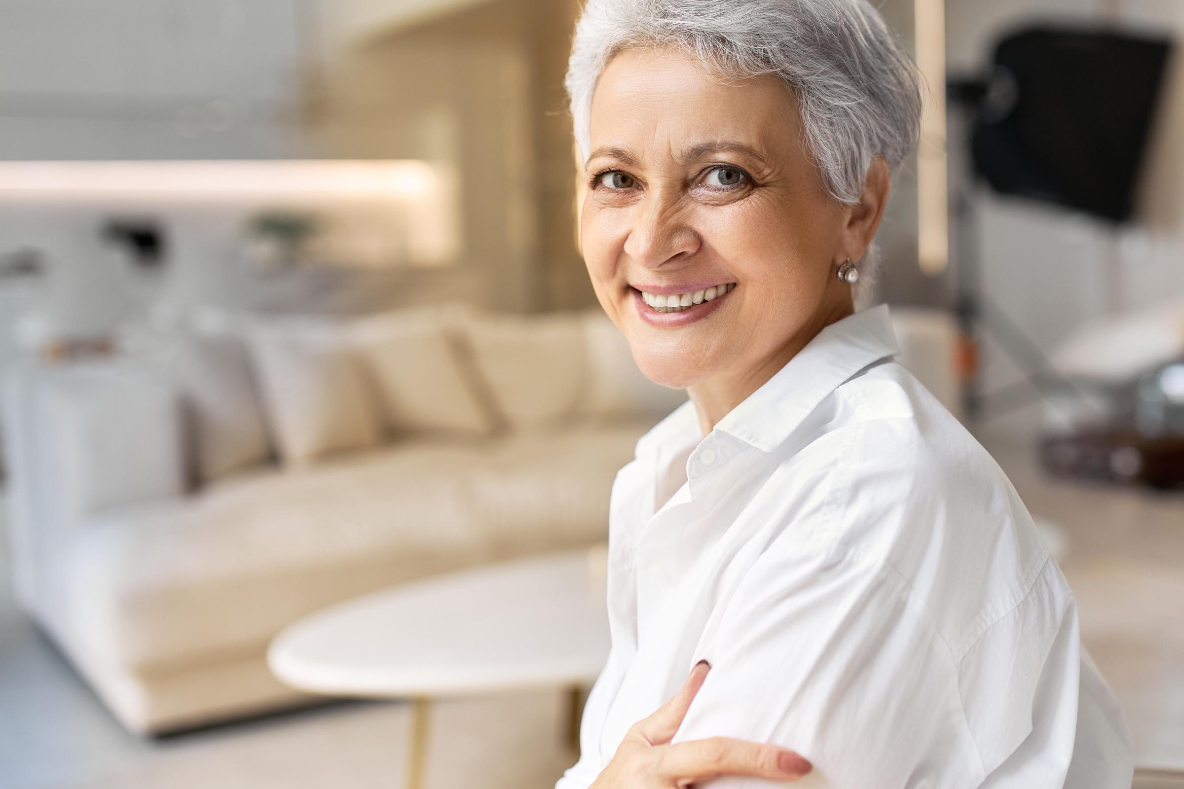 A smiling older woman | Source: Freepik