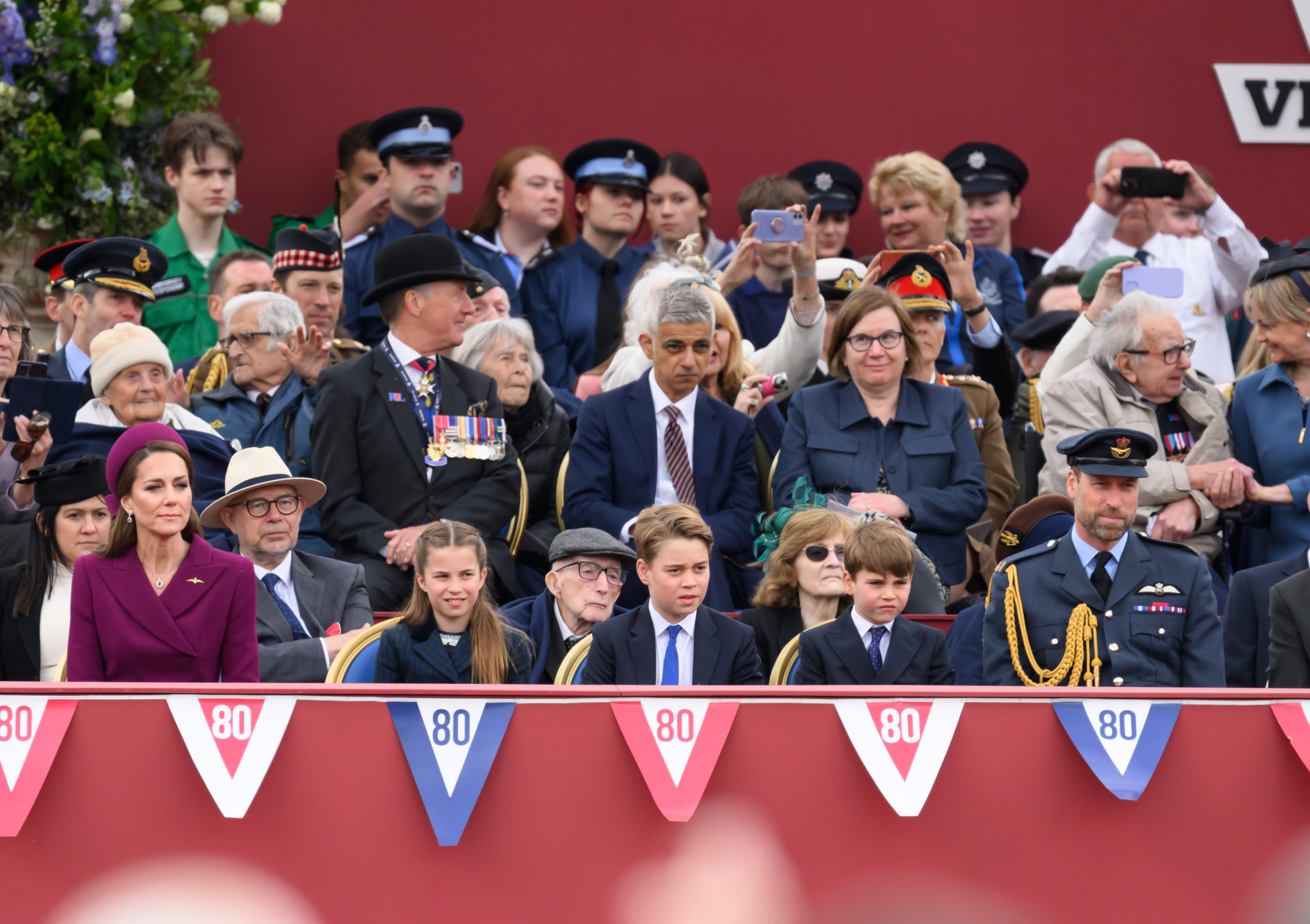 L-R) Catherine, Princess of Wales, Princess Charlotte of Wales, Prince George of Wales, Prince Louis of Wales and Prince William, Prince of Wales during the military procession to mark the 80th anniversary of VE Day on May 5, 2025, in London, England. | Source: Getty Images
