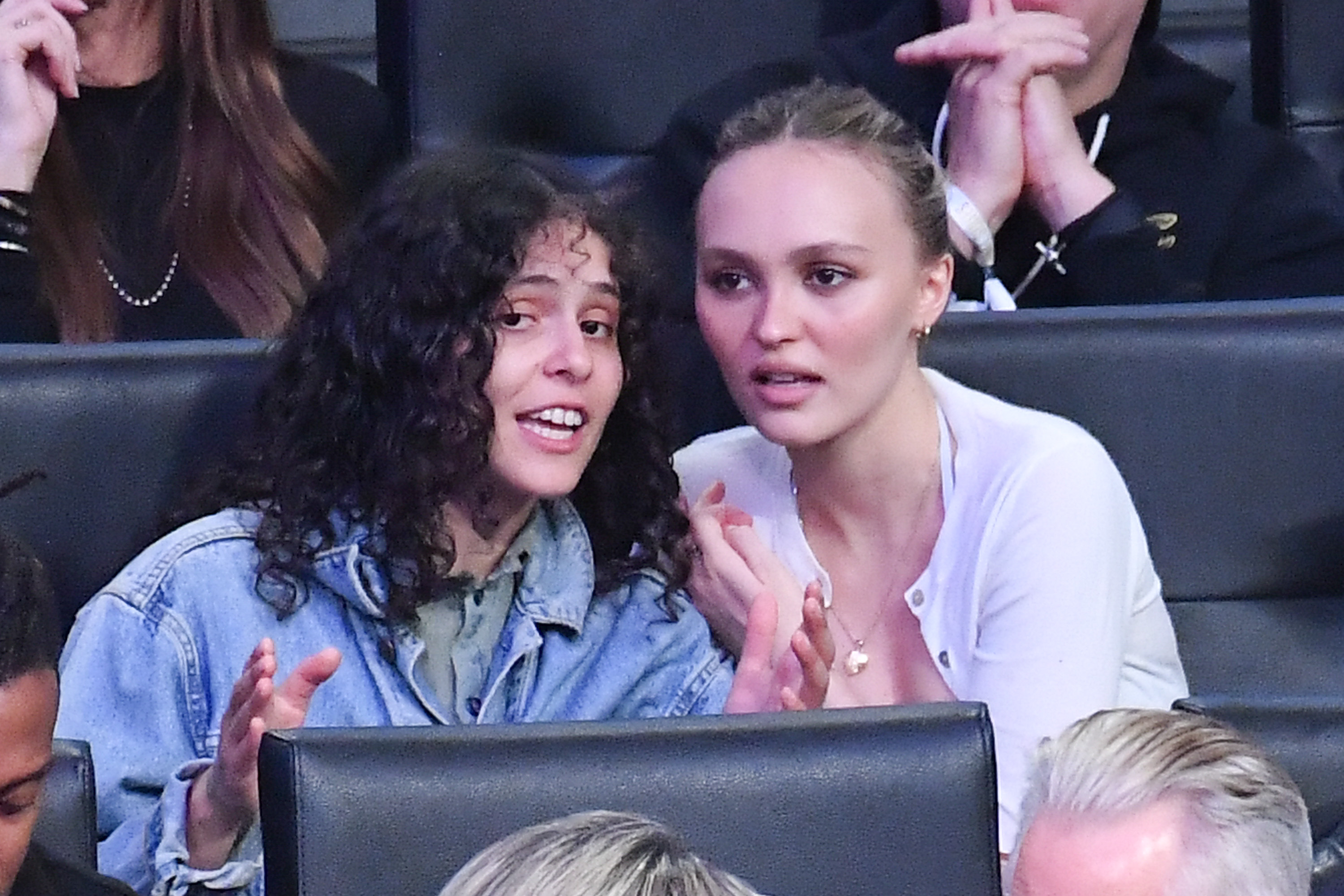 Lily-Rose Depp and 070 Shake attend a basketball game between the Los Angeles Lakers and the Minnesota Timberwolves at Crypto.com Arena on April 30, 2025, in Los Angeles, California. | Source: Getty Images