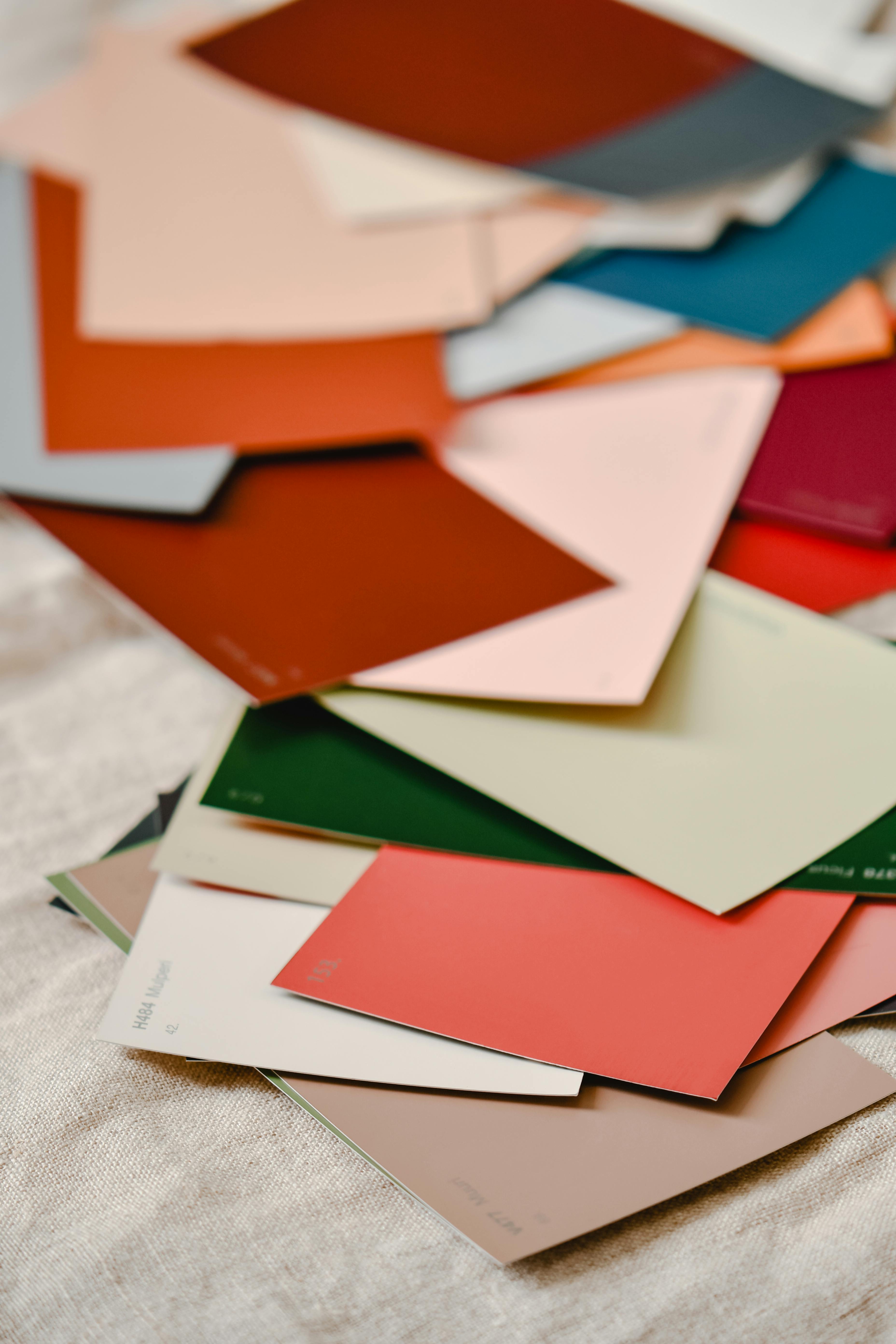 Different colored paint swatches on a table | Source: Pexels