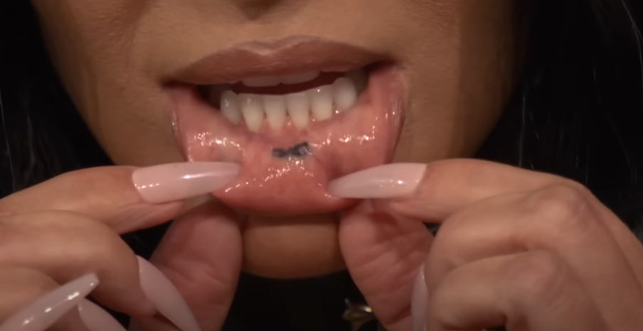 Kim Kardashian's mouth tattoo, which she showed on "The Tonight Show" on September 25, 2025 | Source: Youtube/The Tonight Show Starring Jimmy Fallon