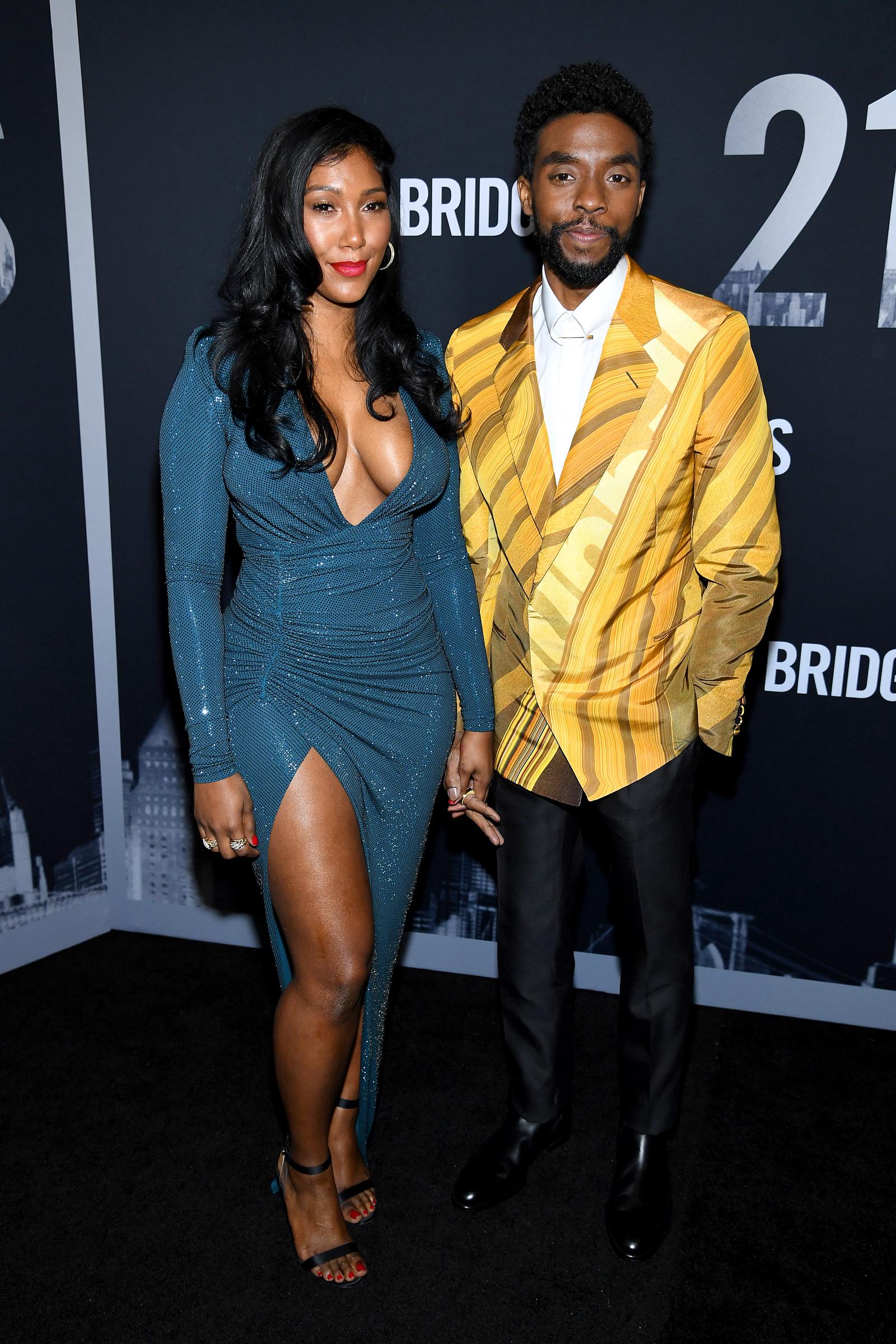 Taylor Simone Ledward and Chadwick Boseman attend the "21 Bridges" New York Screening at AMC Lincoln Square Theater on November 19, 2019. | Source: Getty Images