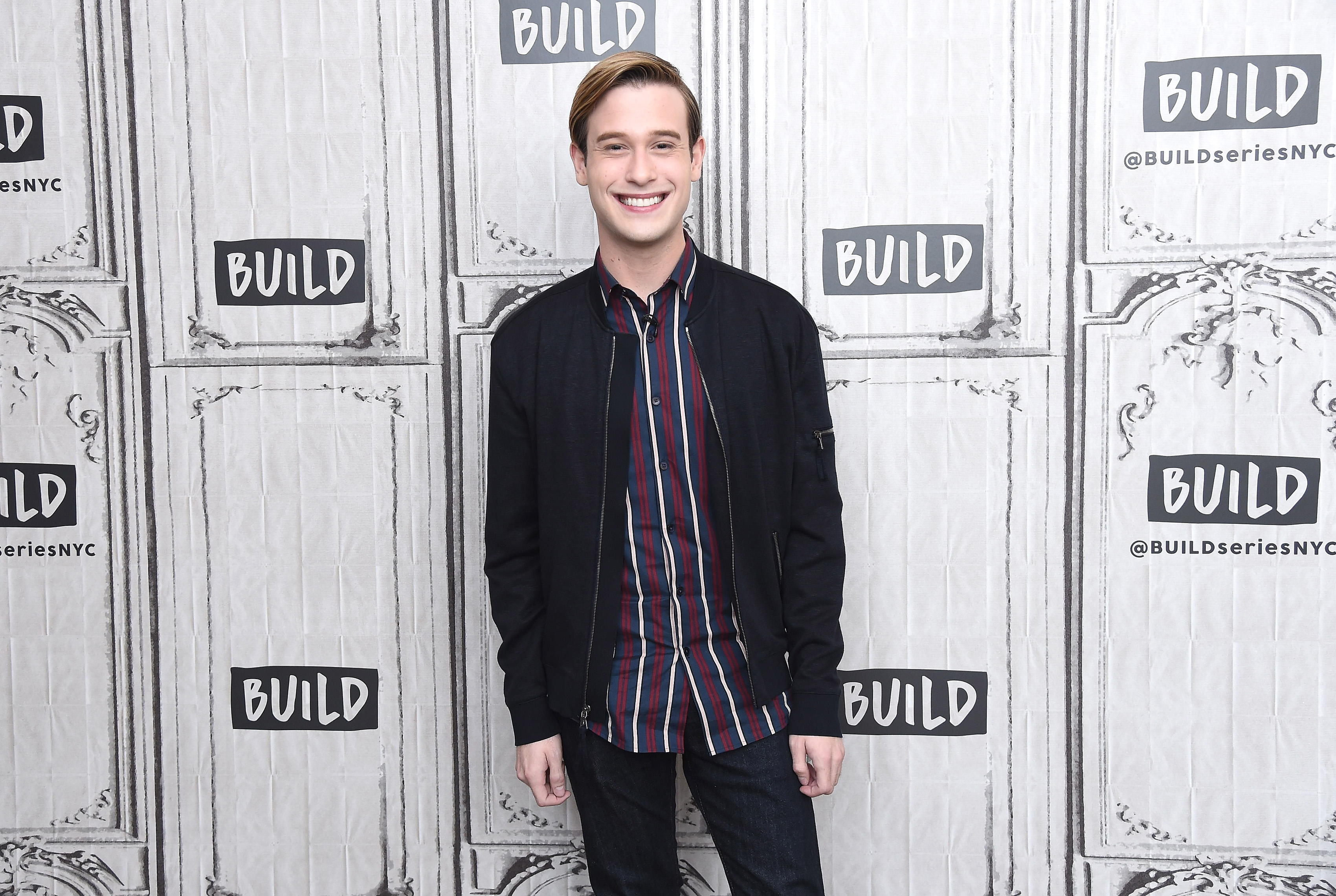 Tyler Henry visits the Build Brunch to discuss the E! Entertainment television series 'Hollywood Medium' at Build Studio on February 19, 2019, in New York City. | Source: Getty Images