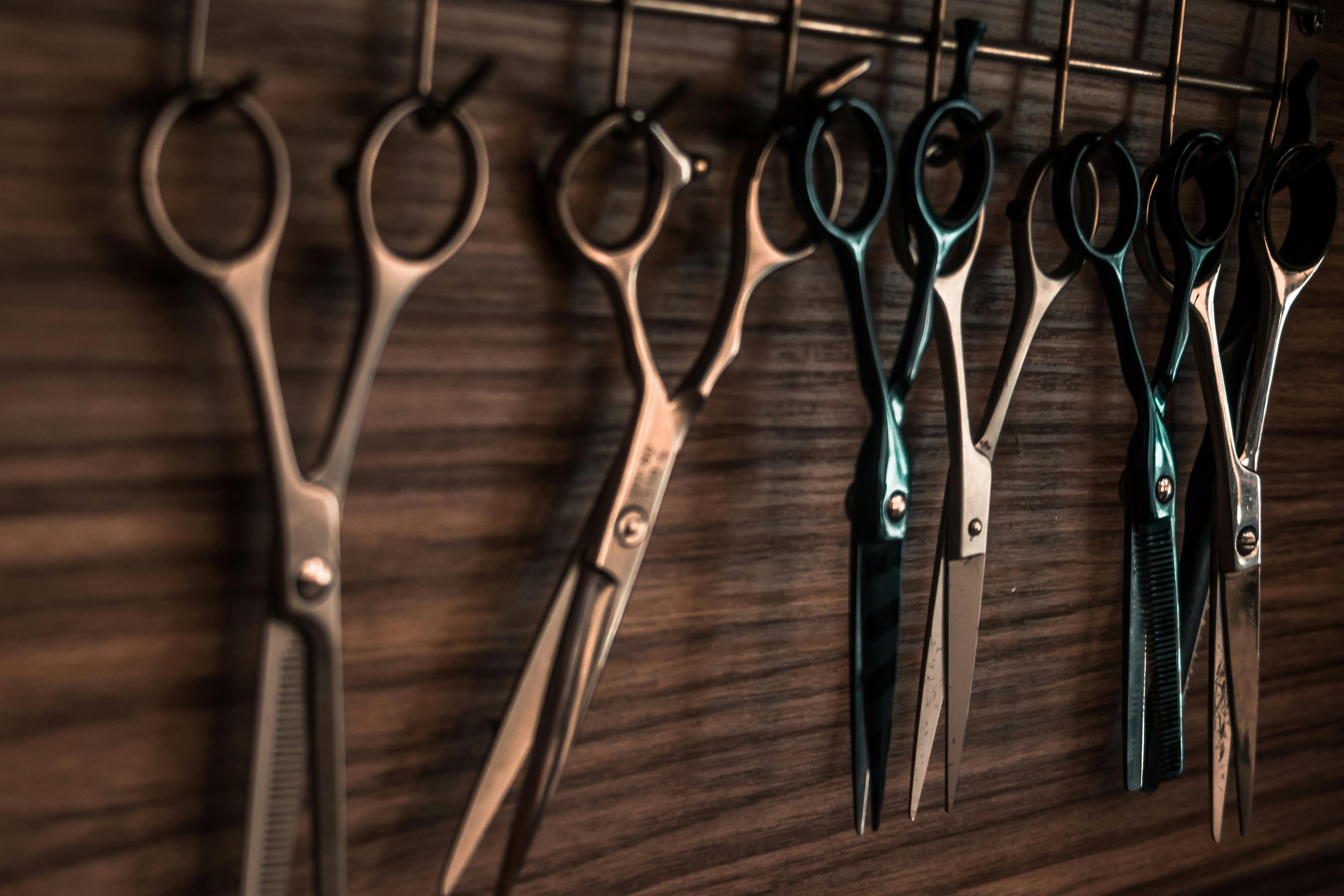 Scissors hanging on a hook | Source: Pexels