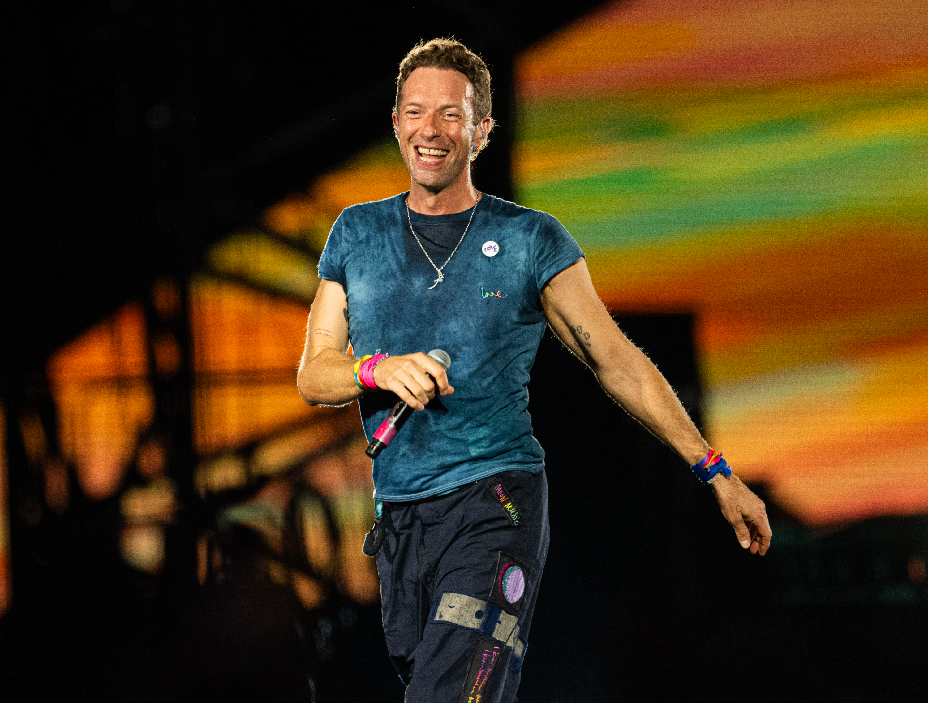 Chris Martin of Coldplay performs onstage during a concert at Wembley Stadium on August 22, 2025, in London, England. | Source: Getty Images