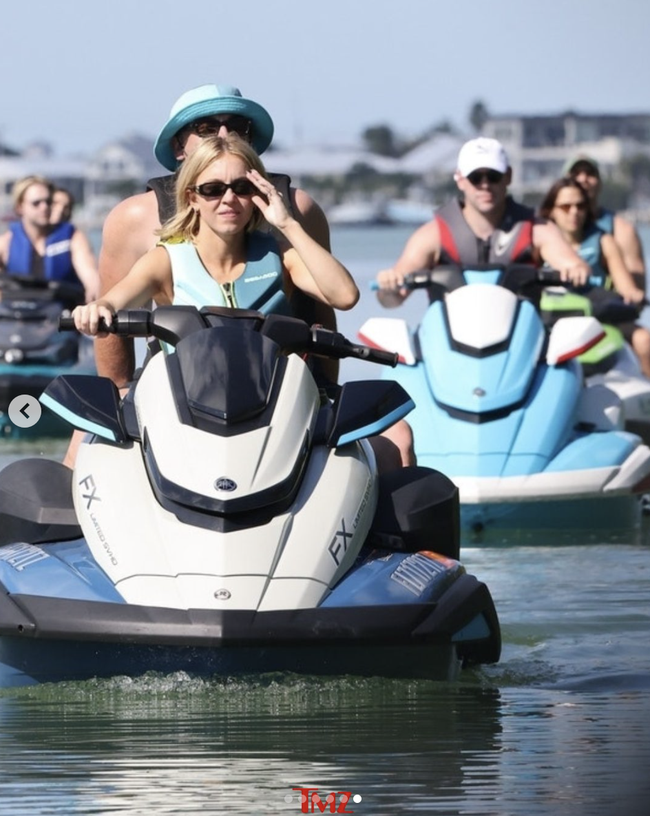 Sydney Sweeney and Scooter Braun riding a jet ski in Florida, posted on November 27, 2025. | Source: Instagram/tmz_tv
