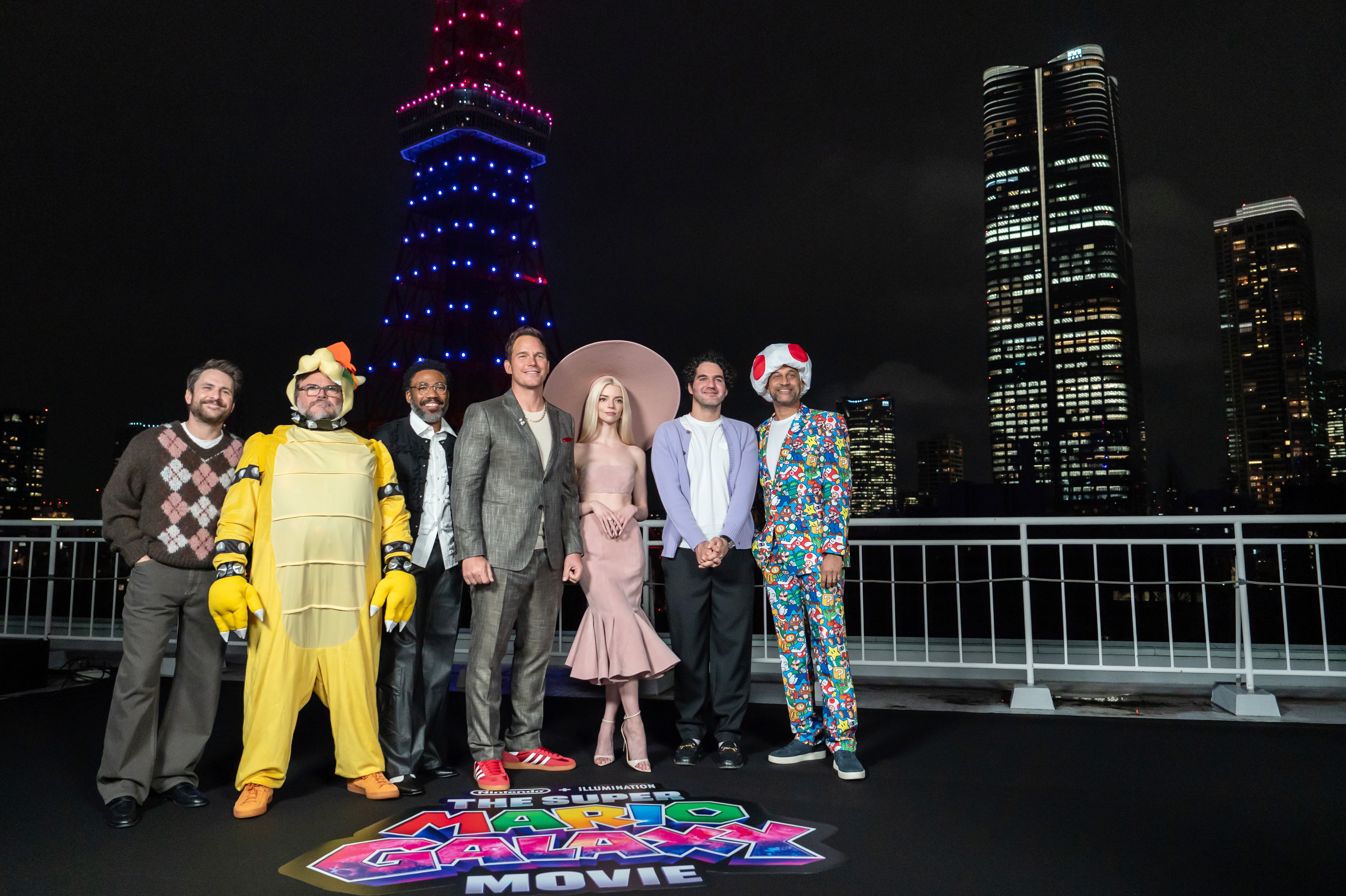 Charlie Day, Jack Black, Donald Glover, Chris Pratt, Anya Taylor-Joy, Benny Safdie and Keegan Michael Key pose for a group photograph during the "Super Mario Galaxy" Tokyo Photocall on March 26, 2026 in Tokyo, Japan. | Source: Getty Images