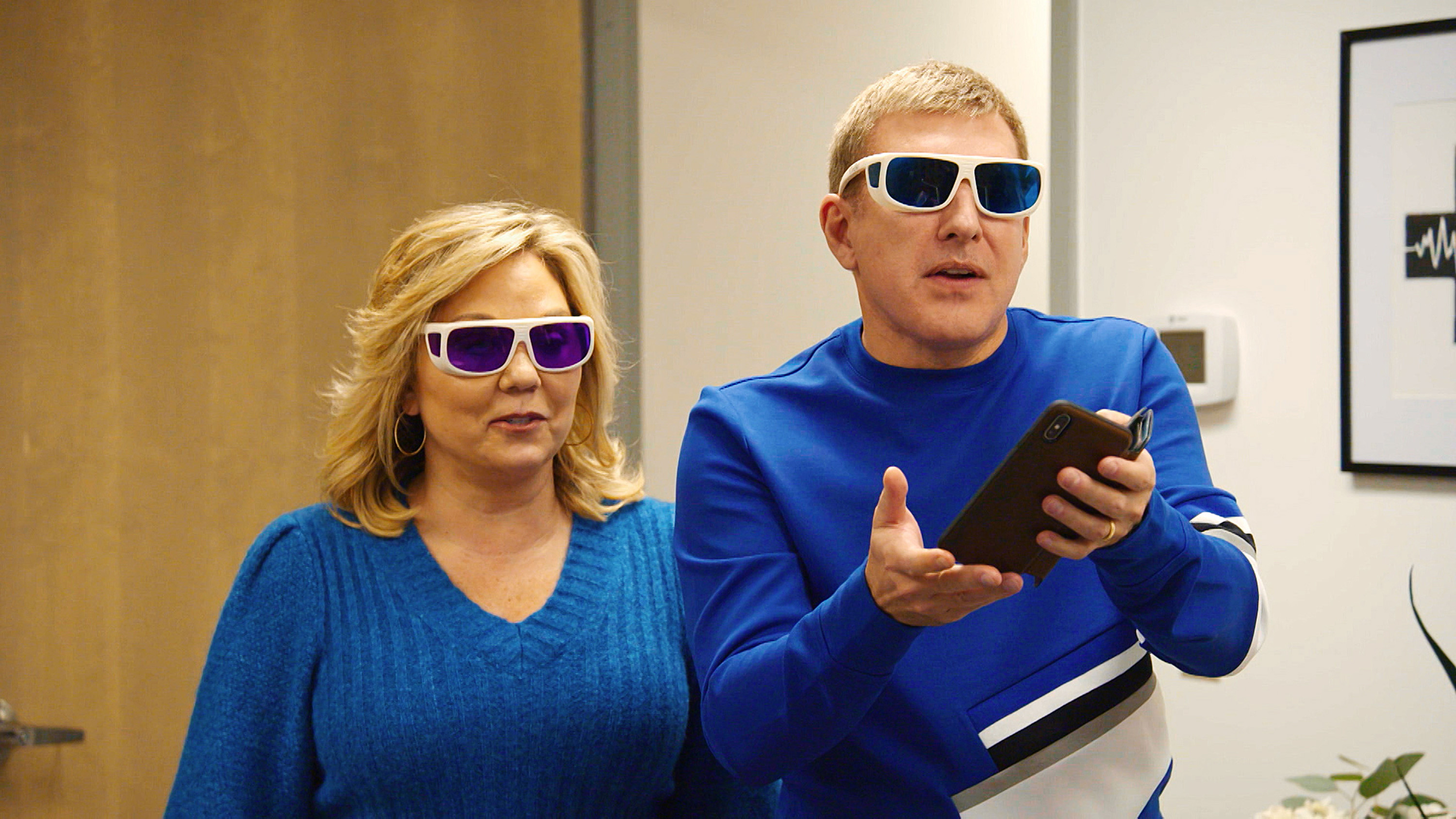 Todd Chrisley and Julie Chrisley on the set of "Chrisley Knows Best" | Source: Getty Images