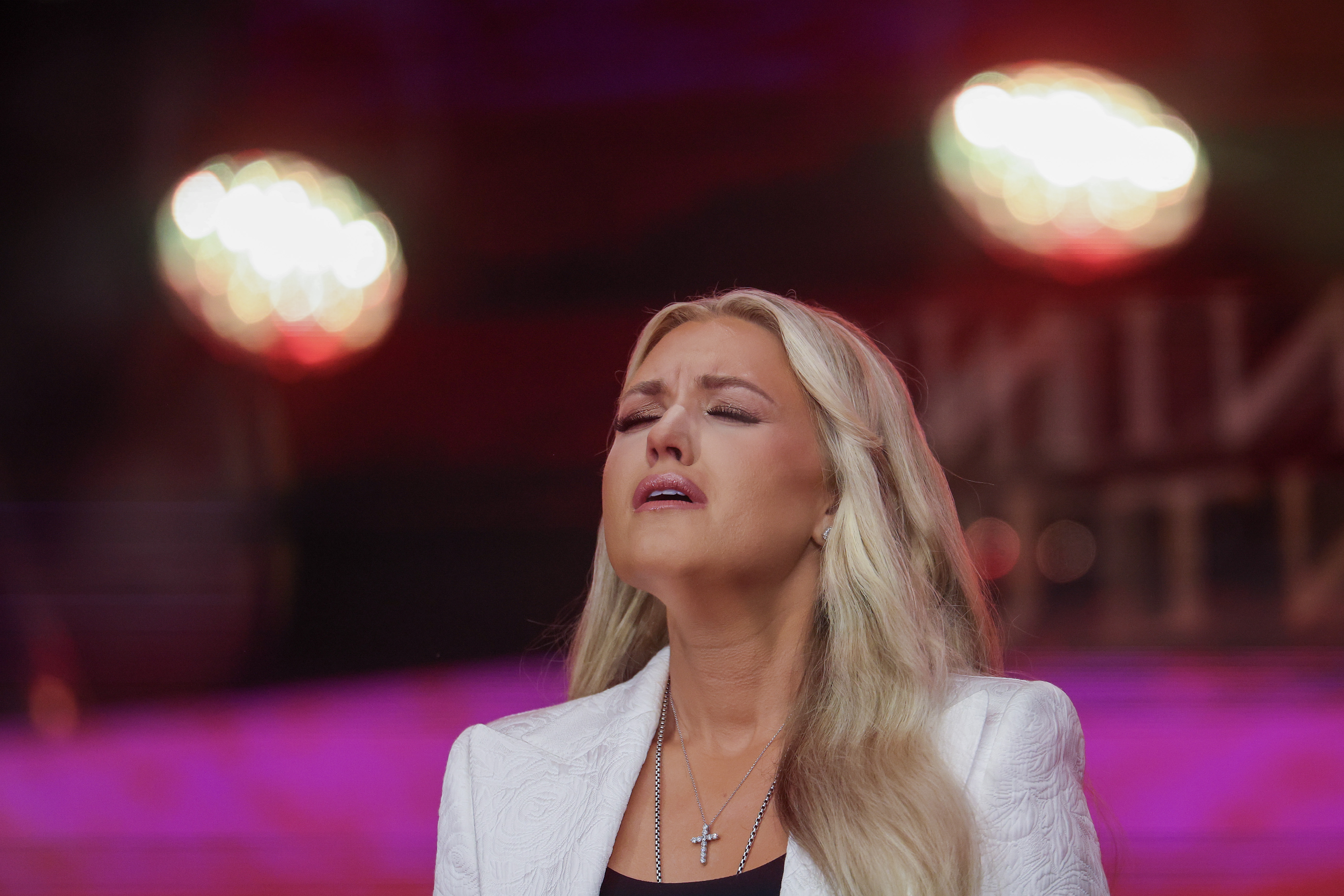 Erika Kirk becomes emotional while speaking at a memorial service for her husband, Charlie Kirk in Glendale, Arizona on September 21, 2025 | Source: Getty Images