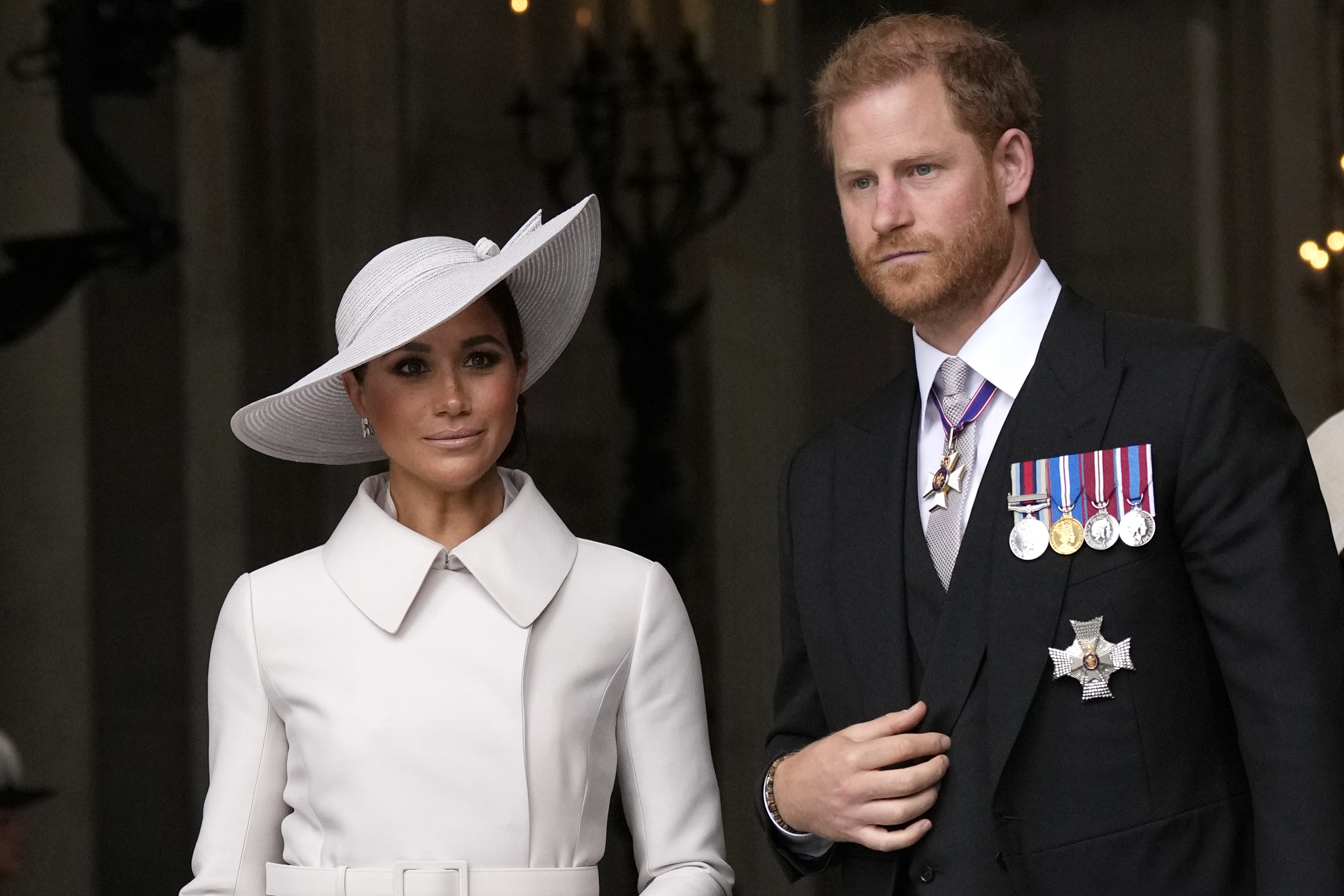 Prince Harry and Meghan Markle, Duke and Duchess of Sussex leave after a service of thanksgiving for the reign of Queen Elizabeth II at St Paul's Cathedral in London, Friday, June 3, 2022. | Source: Getty Images