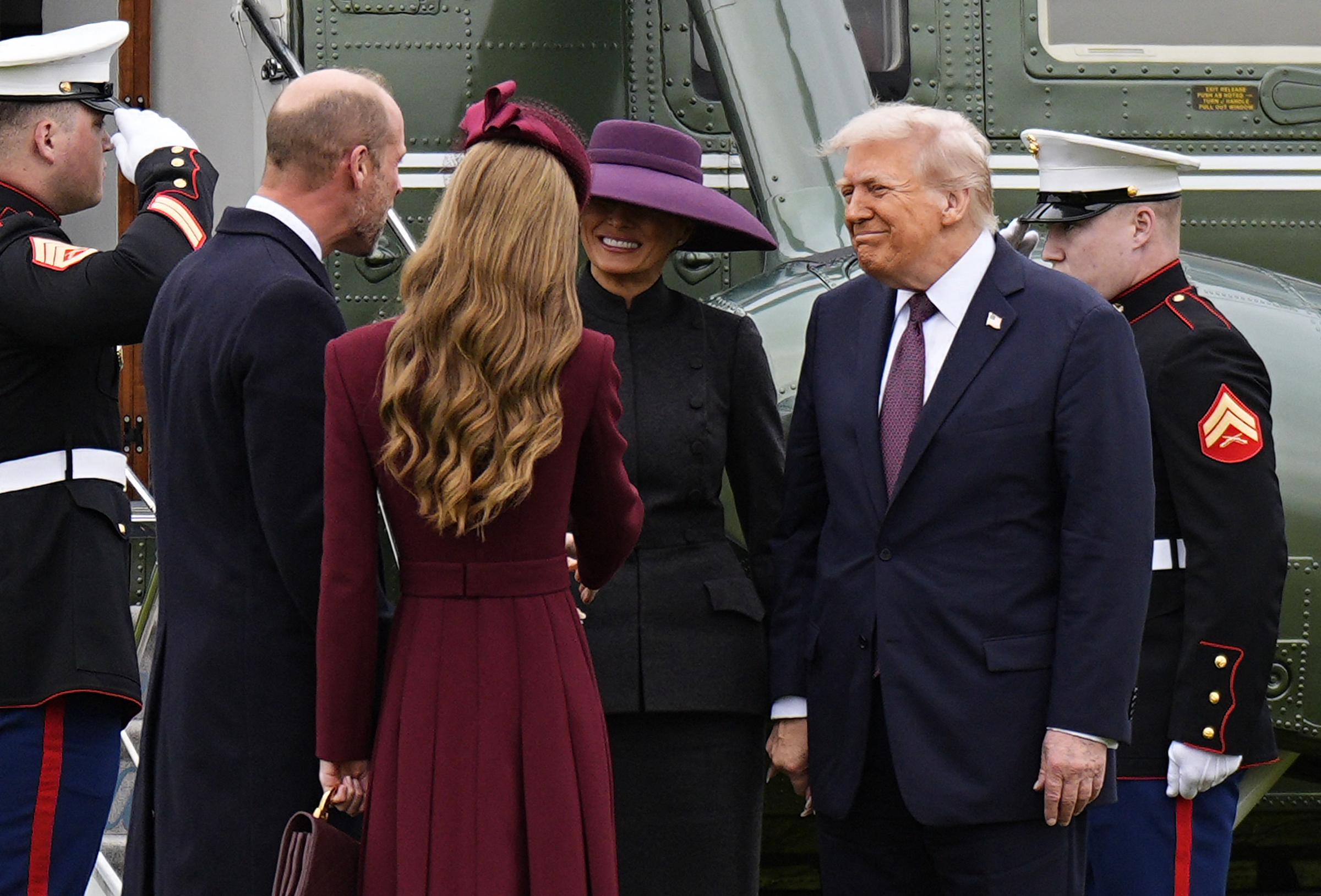 US President Donald Trump and First Lady Melania Trump are greeted by Britain's Prince William, Prince of Wales and Britain's Catherine, Princess of Wales, upon their arrival at the grounds of Windsor Castle, in Windsor, on September 17, 2025. | Source: Getty Images