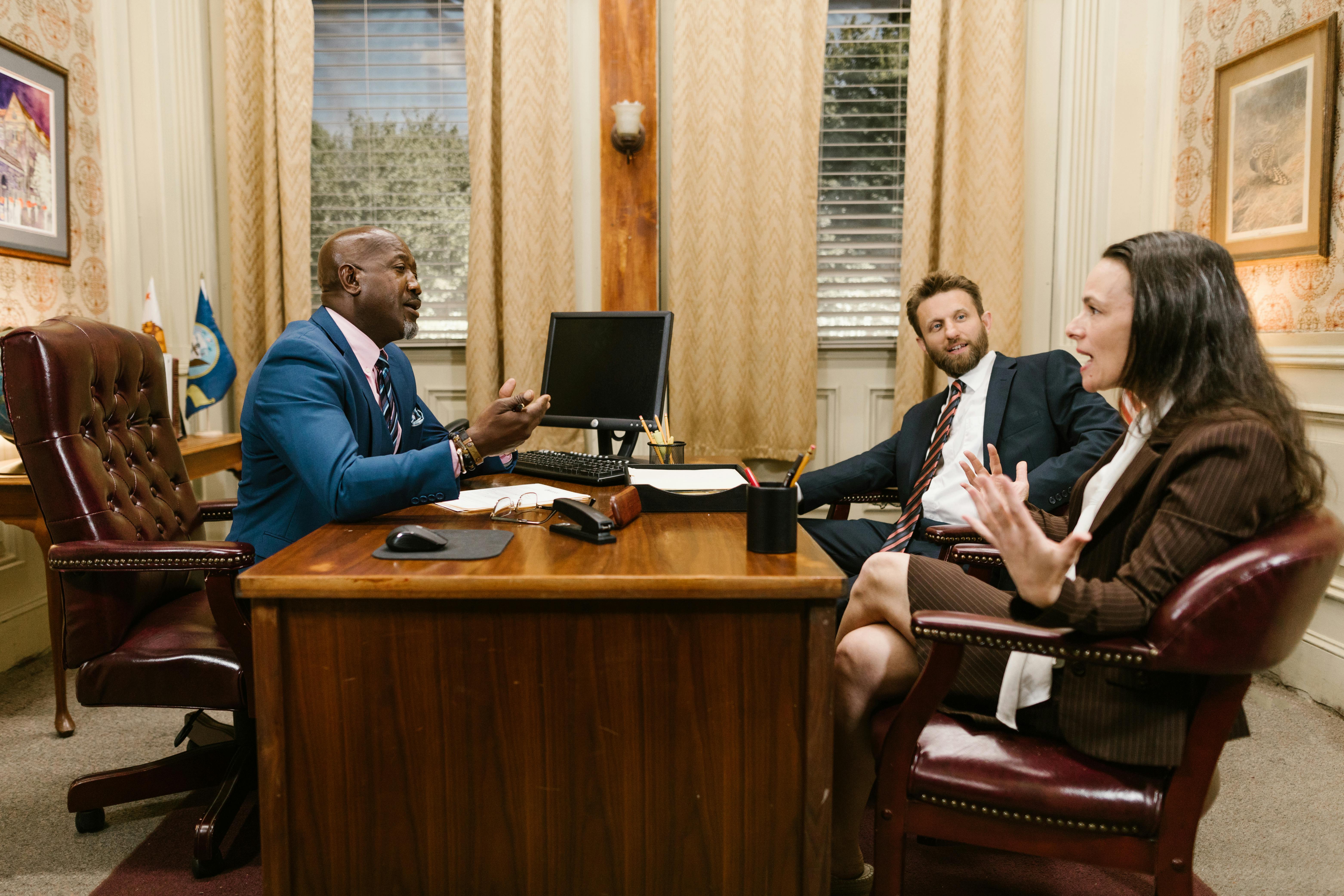 People sitting in an office | Source: Pexels