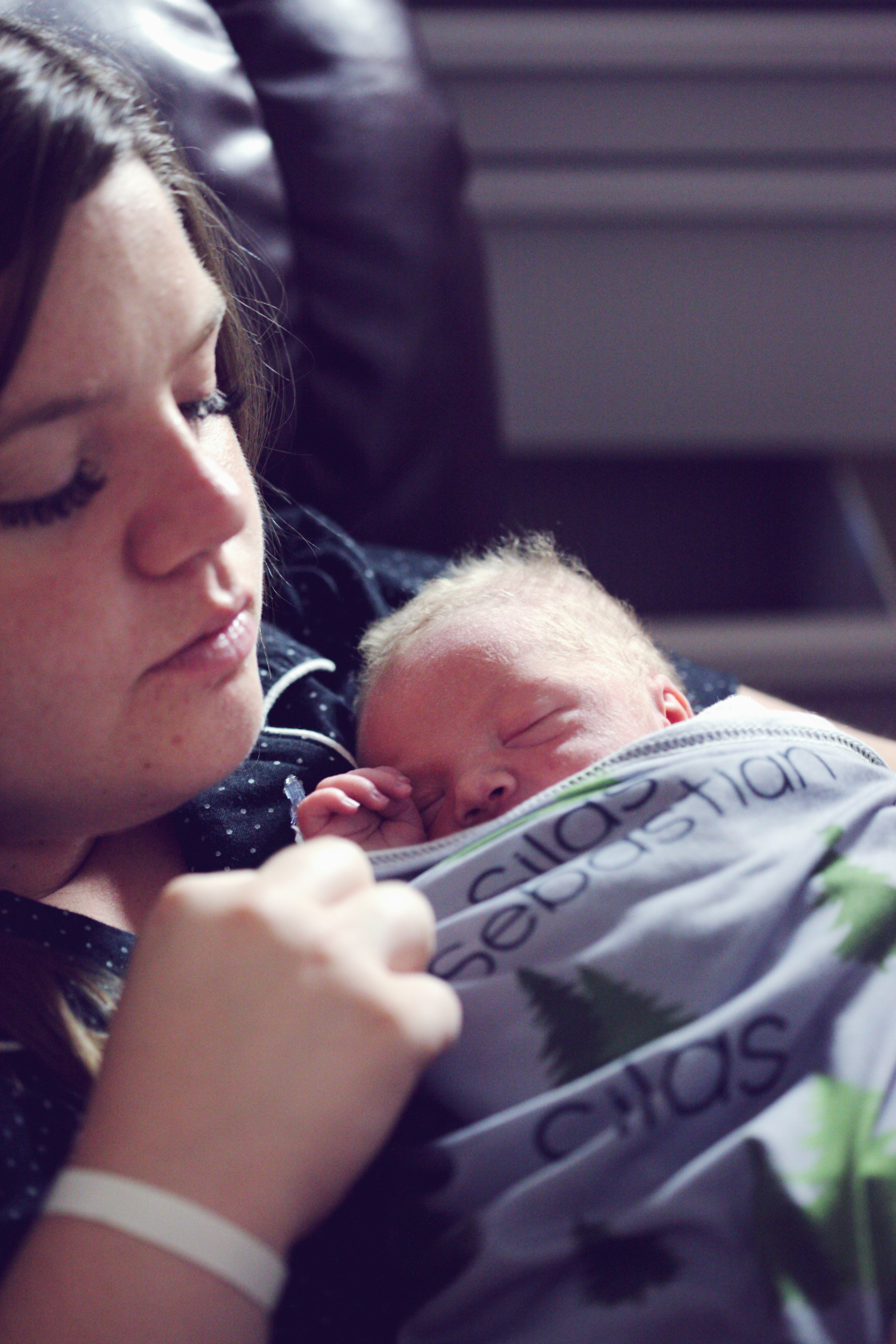 A woman holding a baby | Source: Unsplash