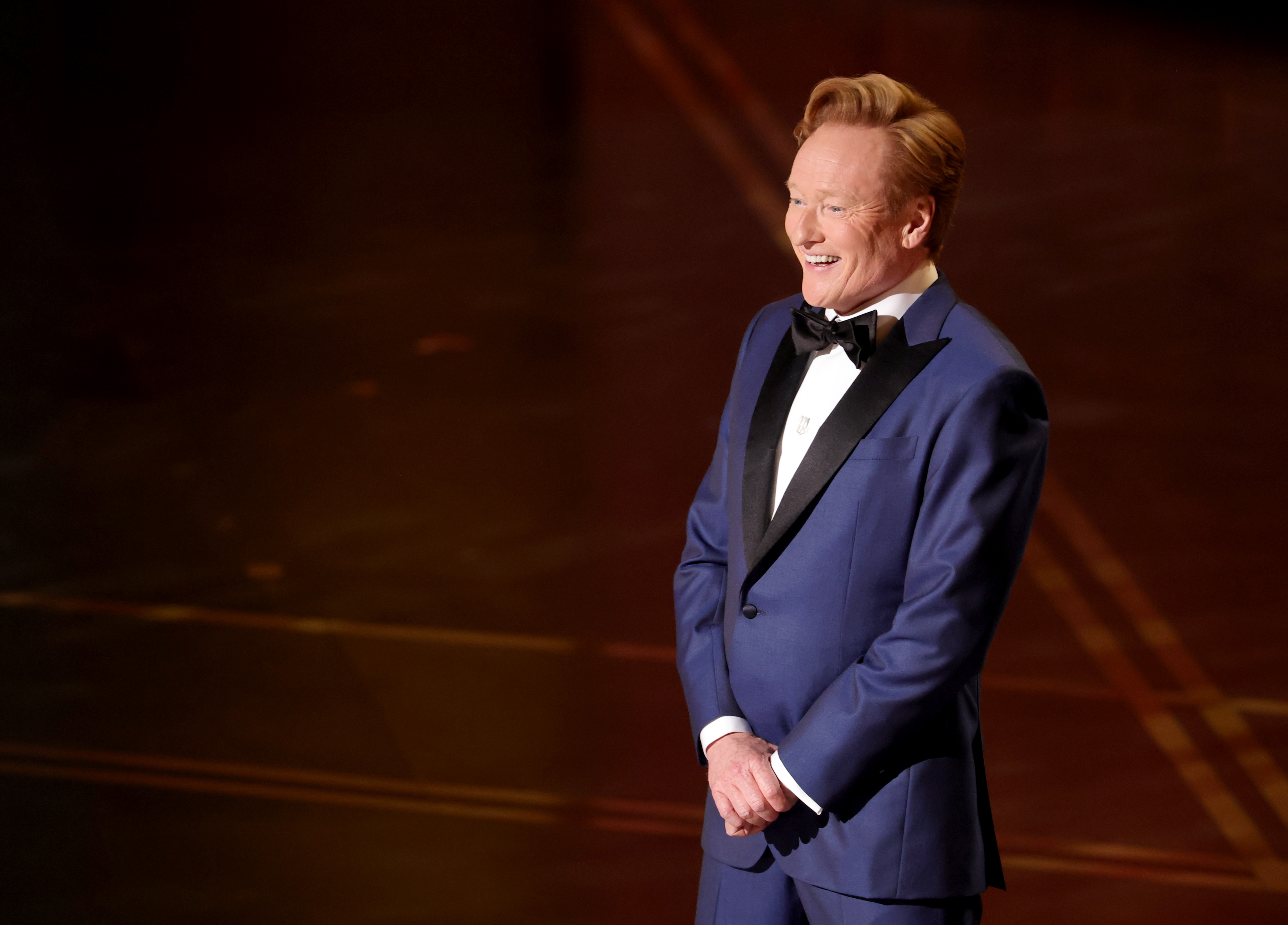 Conan O'Brien speaks onstage during the 98th Oscars at Dolby Theatre on March 15, 2026 in Hollywood, California. | Source: Getty Images