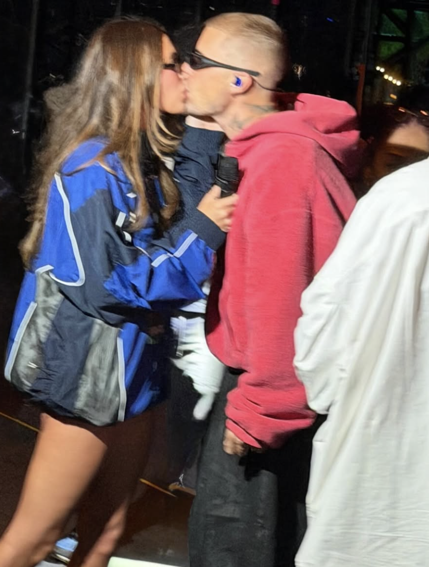 Hailey and Justin Bieber sharing a kiss during the Coachella Valley Music and Arts Festival, posted on April 14, 2026. | Source: Instagram/haileybieber