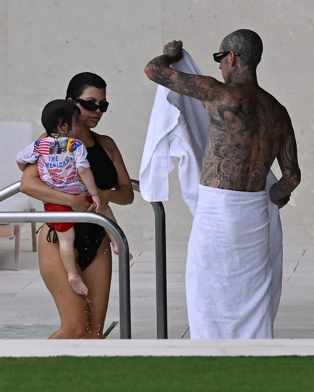 Kourtney Kardashion is seen with her husband, Travis Barker, and their son at the beach in Miami on Wednesday, August 27, 2025. | Source: Instagram/pagesix
