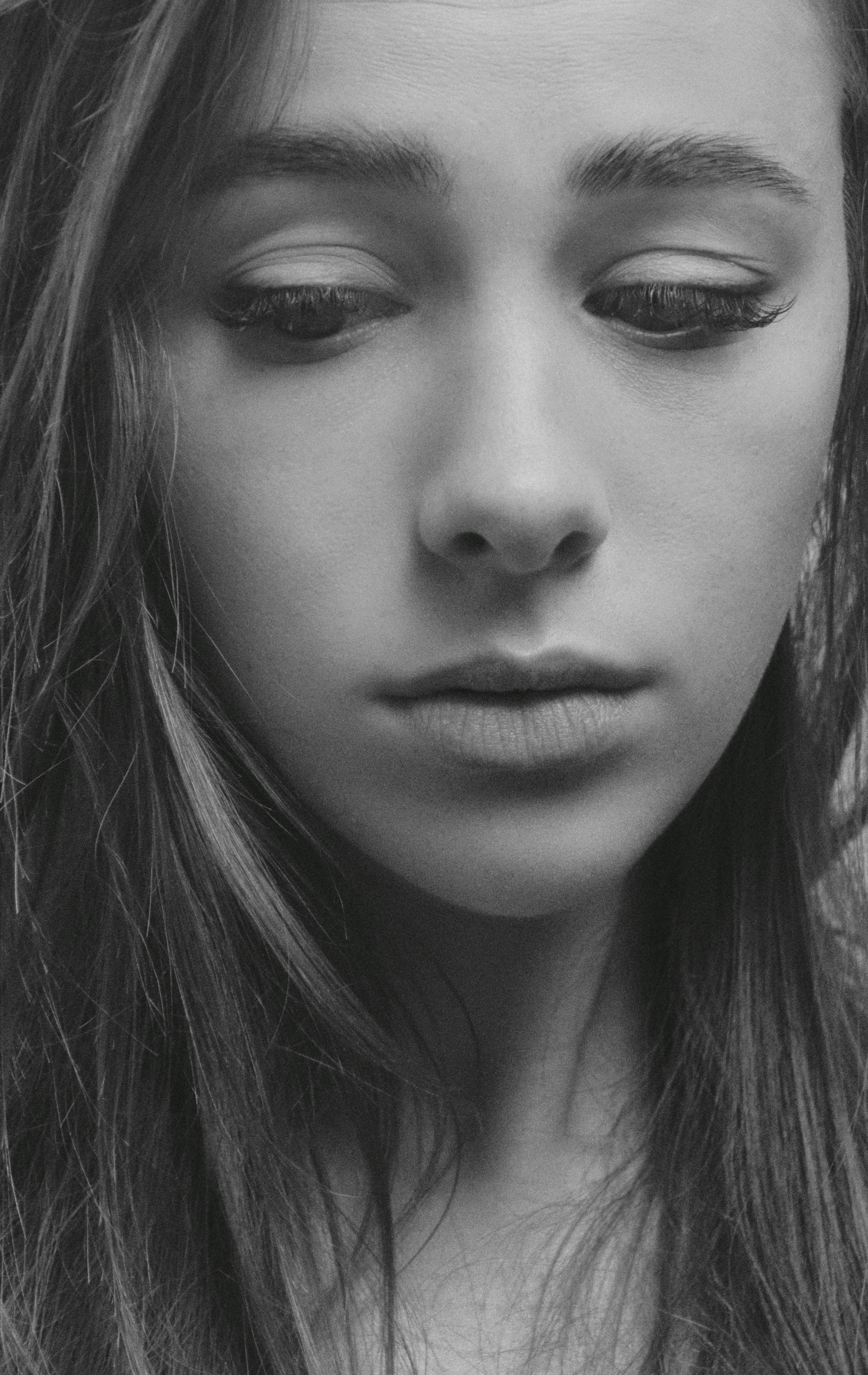 Uma adolescente chateada | Fonte: Unsplash