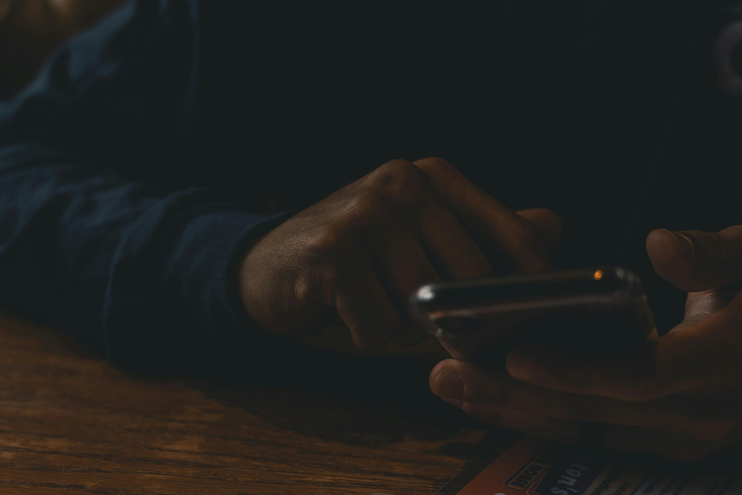 A man uses his phone | Source: Pexels