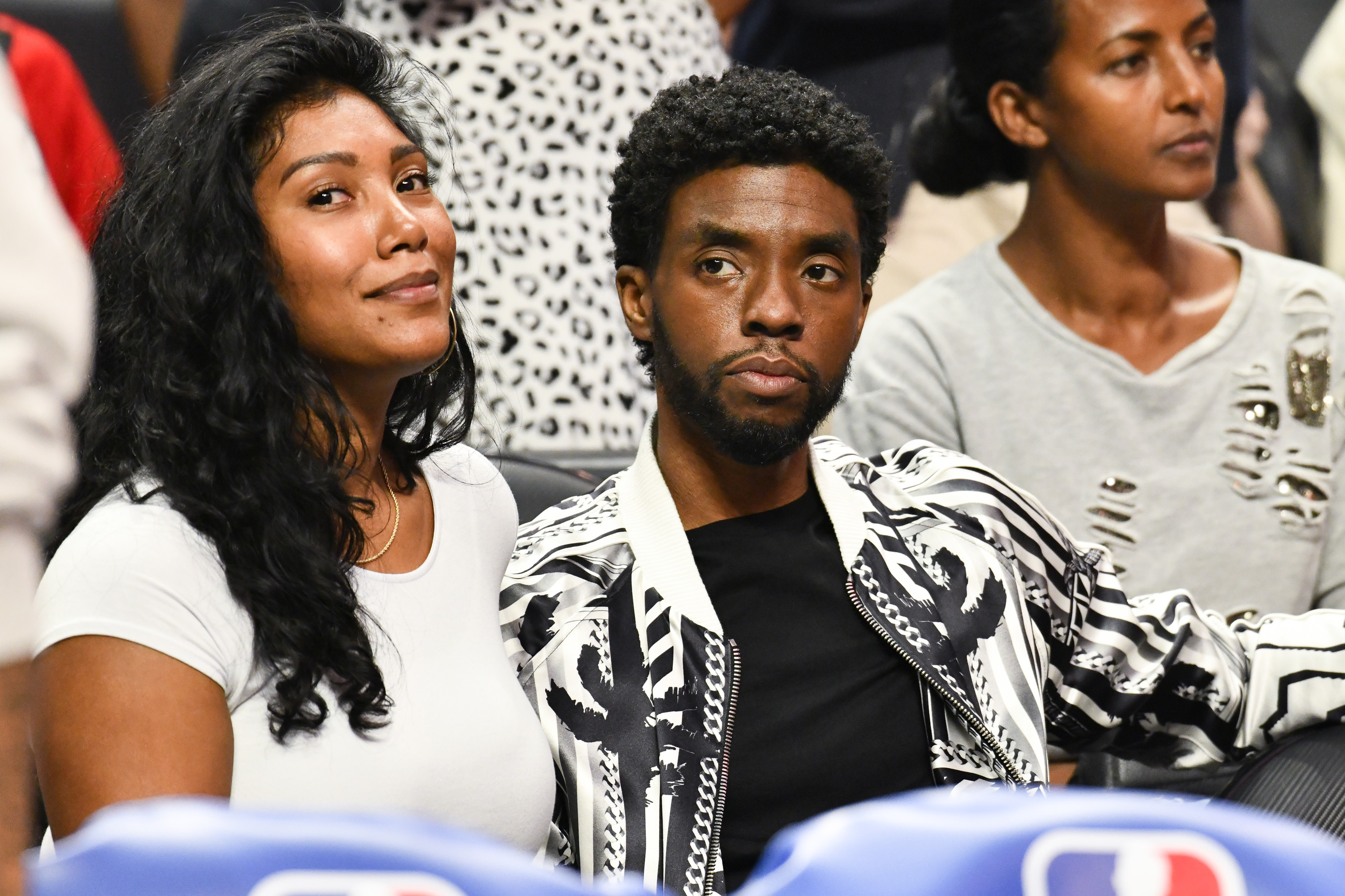 Taylor Simone Ledward and Chadwick Boseman attend a basketball game between the Los Angeles Clippers and the Los Angeles Lakers at Staples Center on October 22, 2019 in Los Angeles, California. | Source: Getty Images