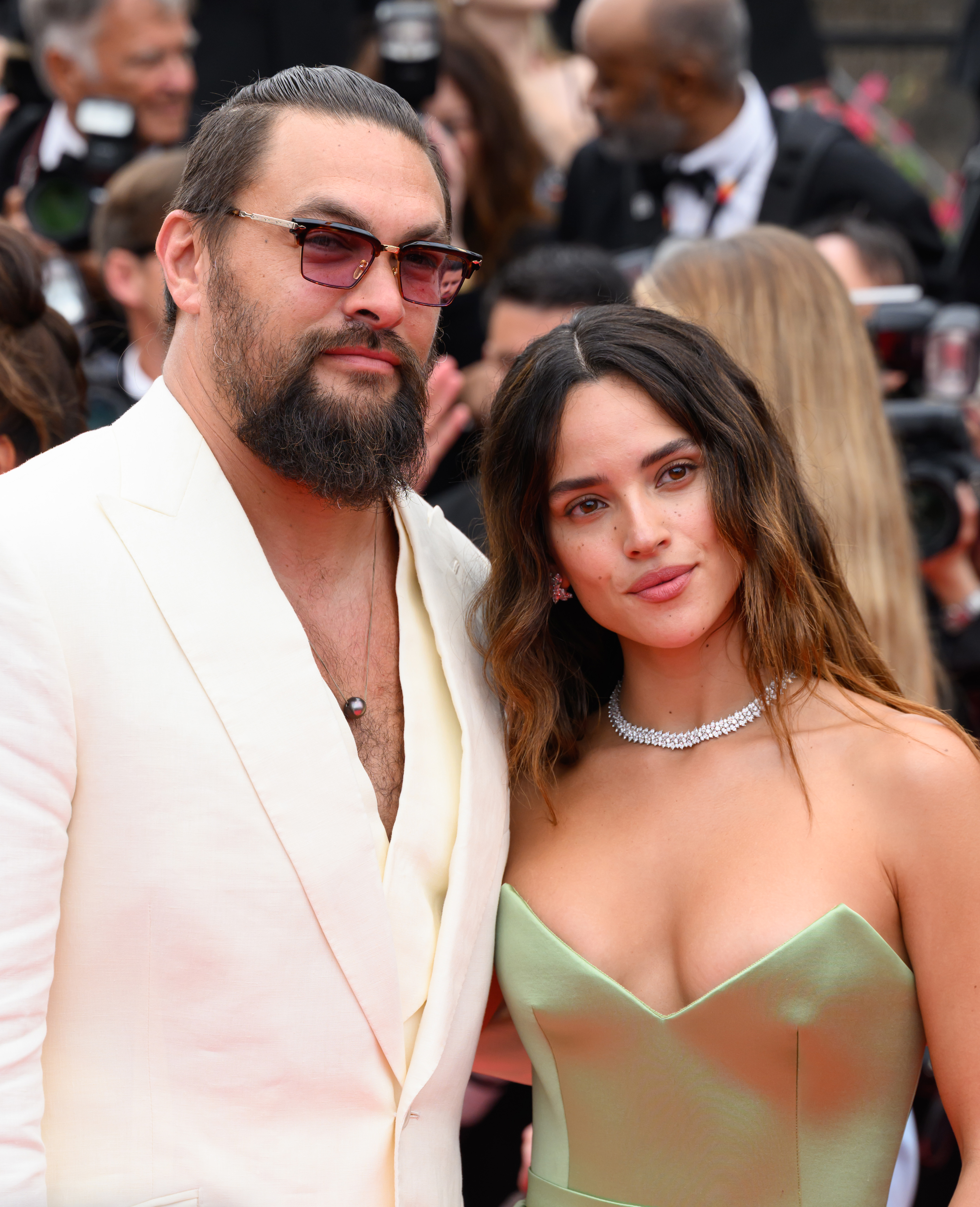 Jason Momoa and Adria Arjona attend the "Highest 2 Lowest" red carpet at the 78th annual Cannes Film Festival at Palais des Festivals on May 19, 2025, in Cannes, France. | Source: Getty Images
