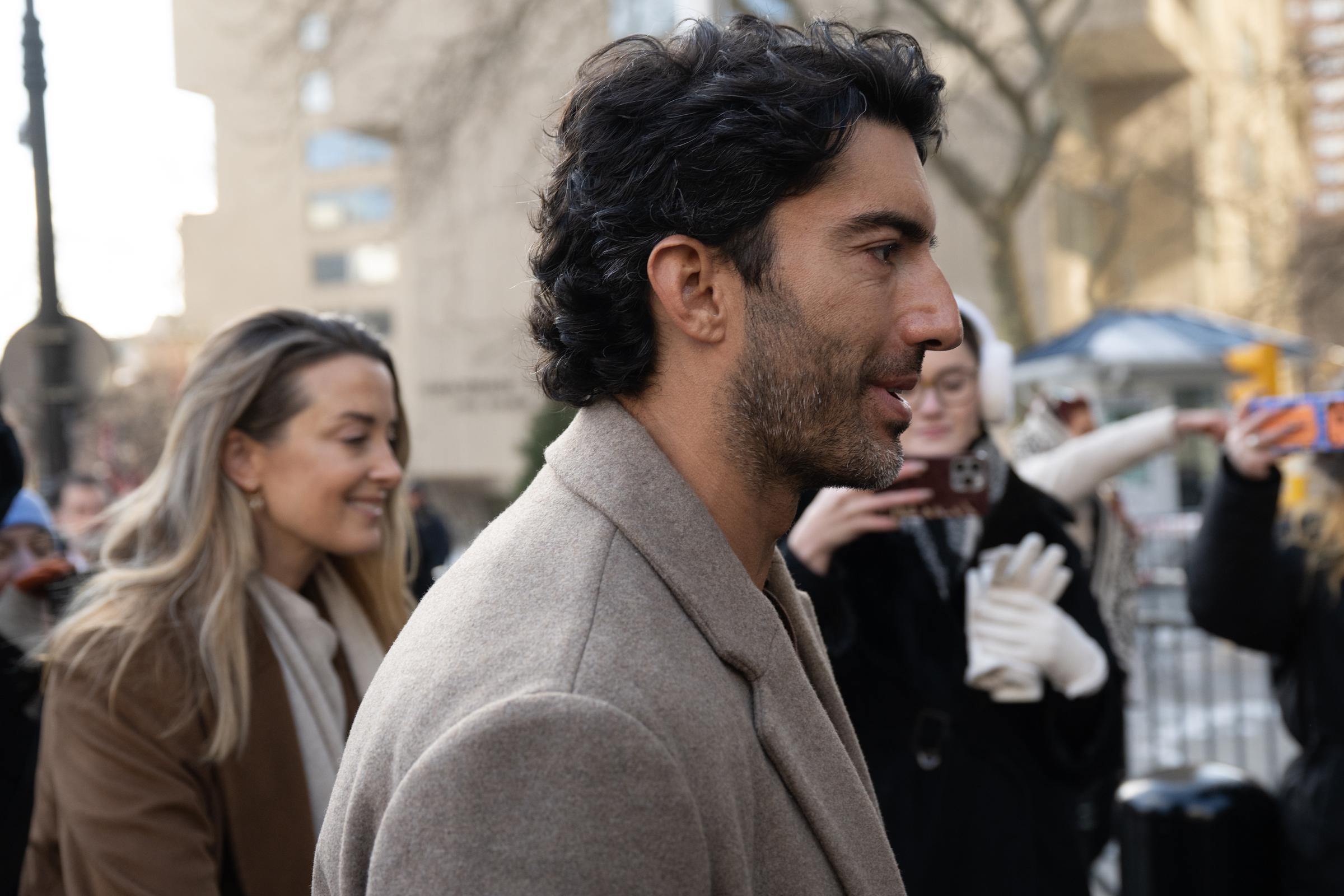 Justin Baldoni and Emily Baldoni arrive at New York Federal Courthouse for his trial against Blake Lively on February 12, 2026 in New York City. | Source: Getty Images