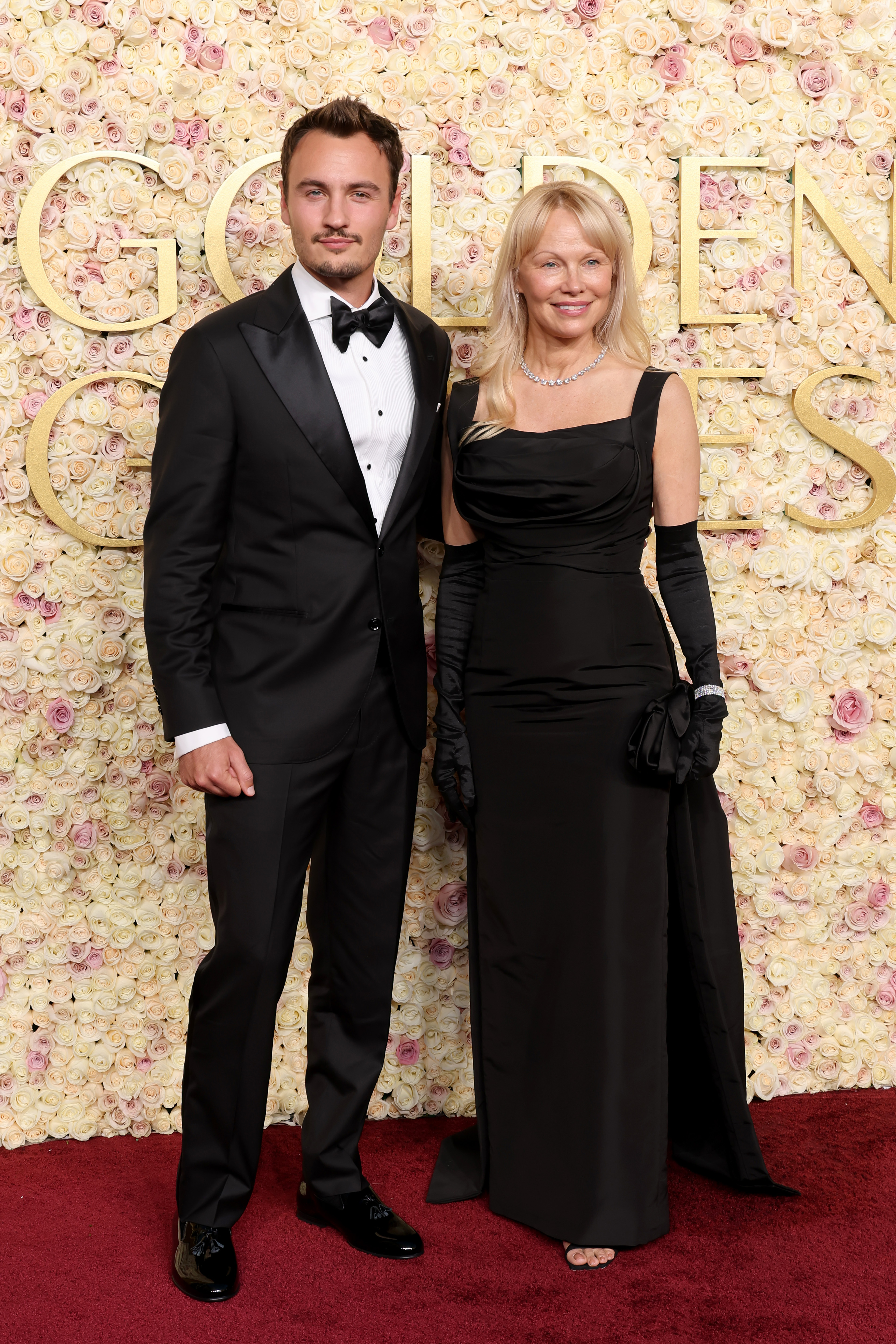Brandon Thomas Lee and Pamela Anderson attend the 82nd Annual Golden Globe Awards at The Beverly Hilton on January 5, 2025, in Beverly Hills, California. | Source: Getty Images