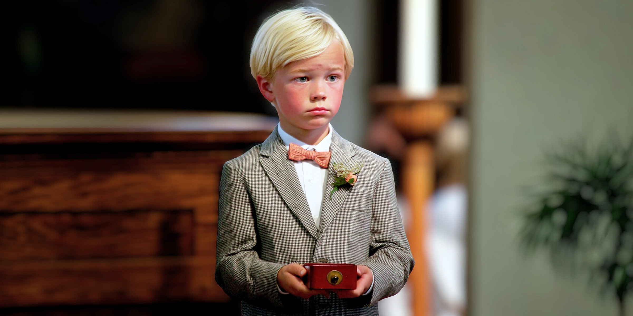 A boy holding a ring box | Source: Barabola