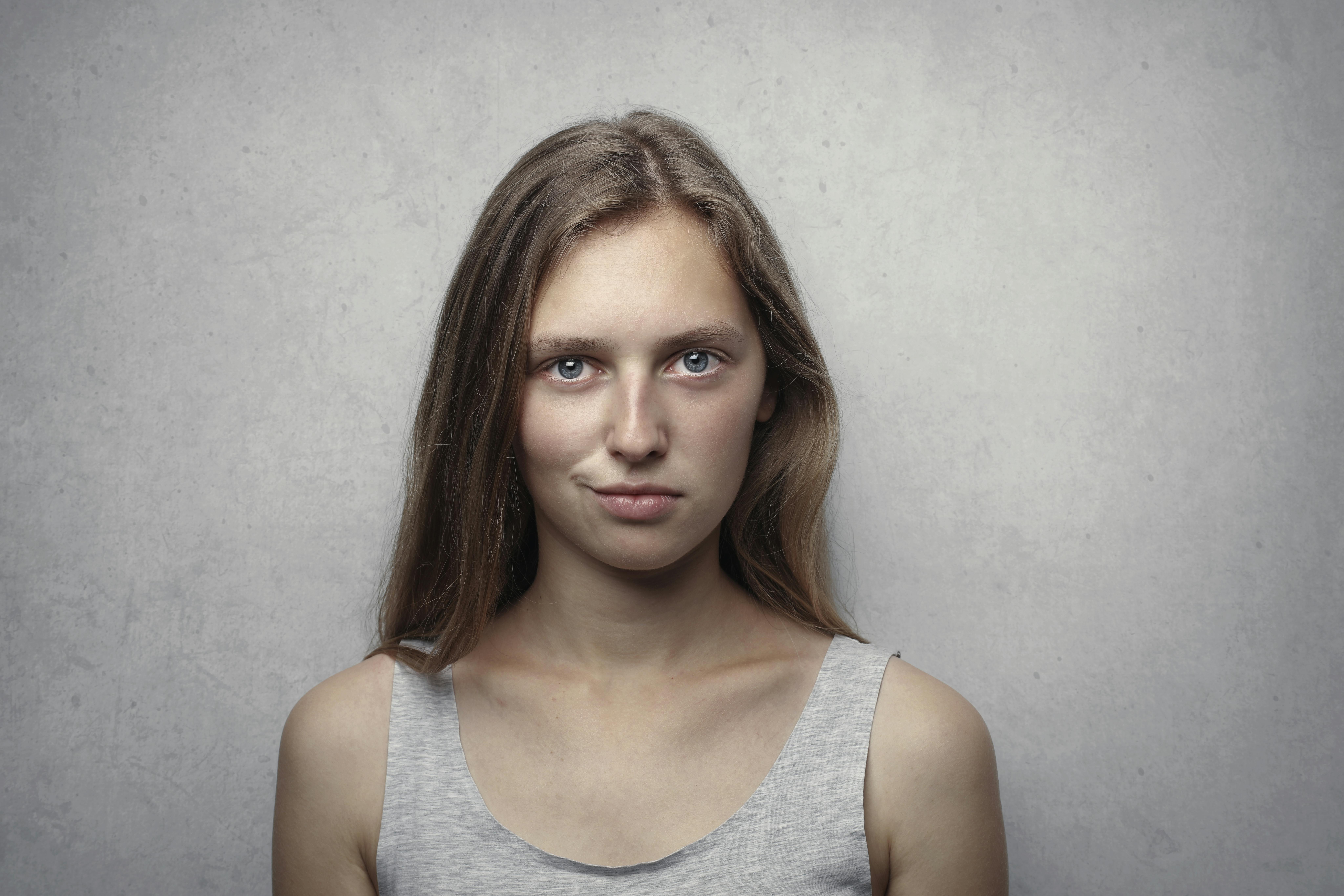 A close-up of a smug woman | Source: Pexels
