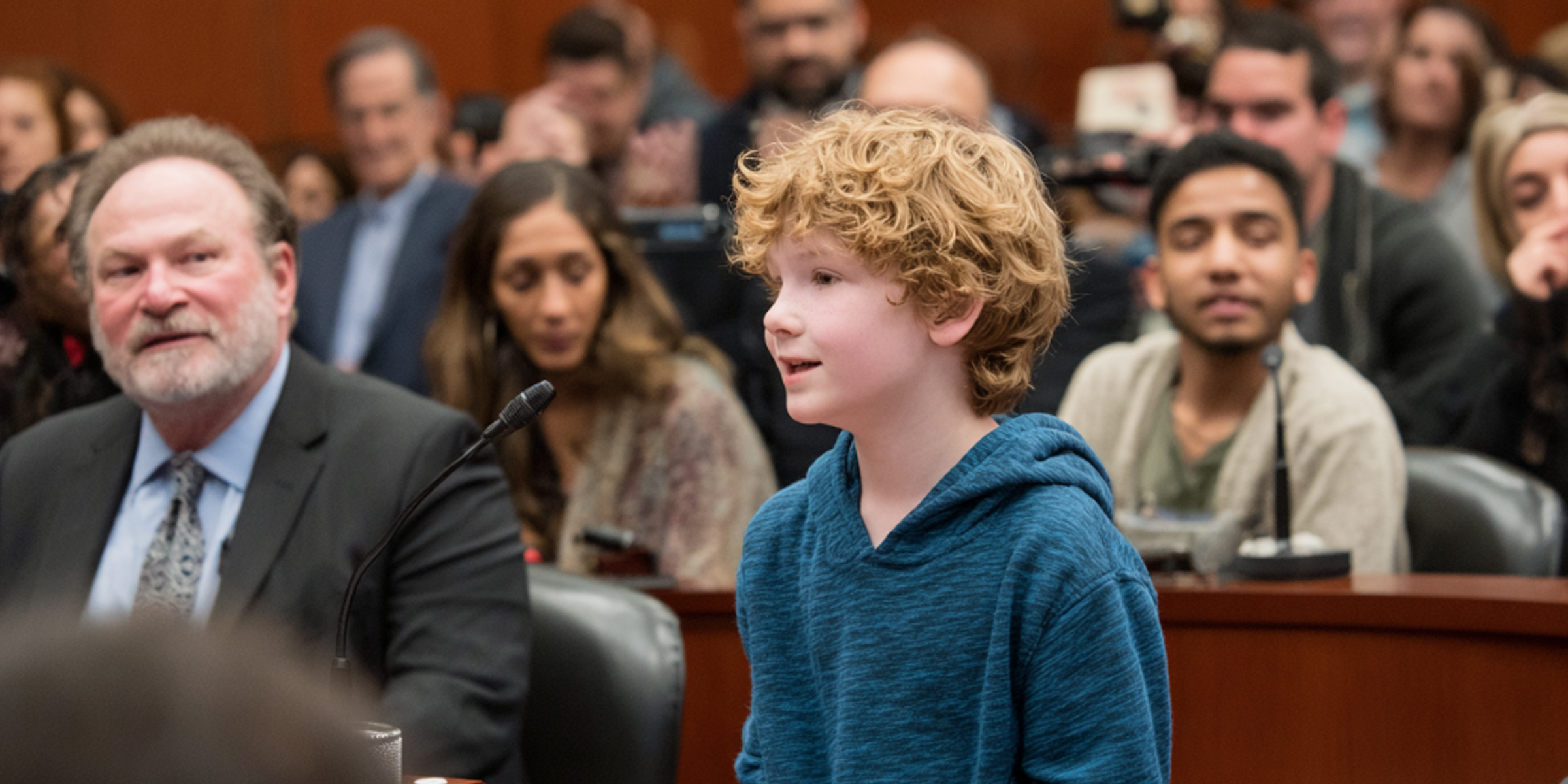 A child speaking in court | Source: Barabola