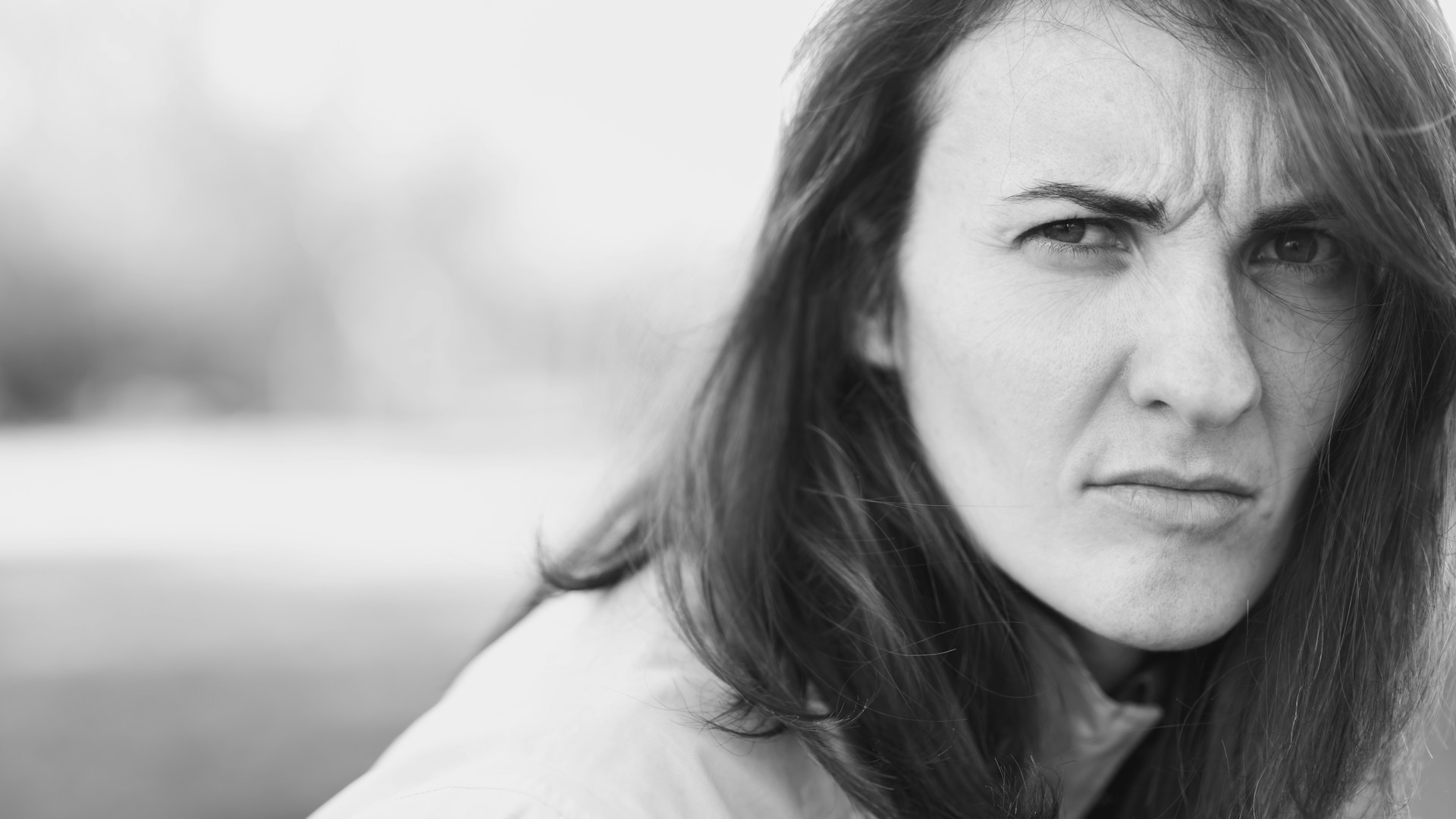 A woman frowning at someone | Source: Unsplash