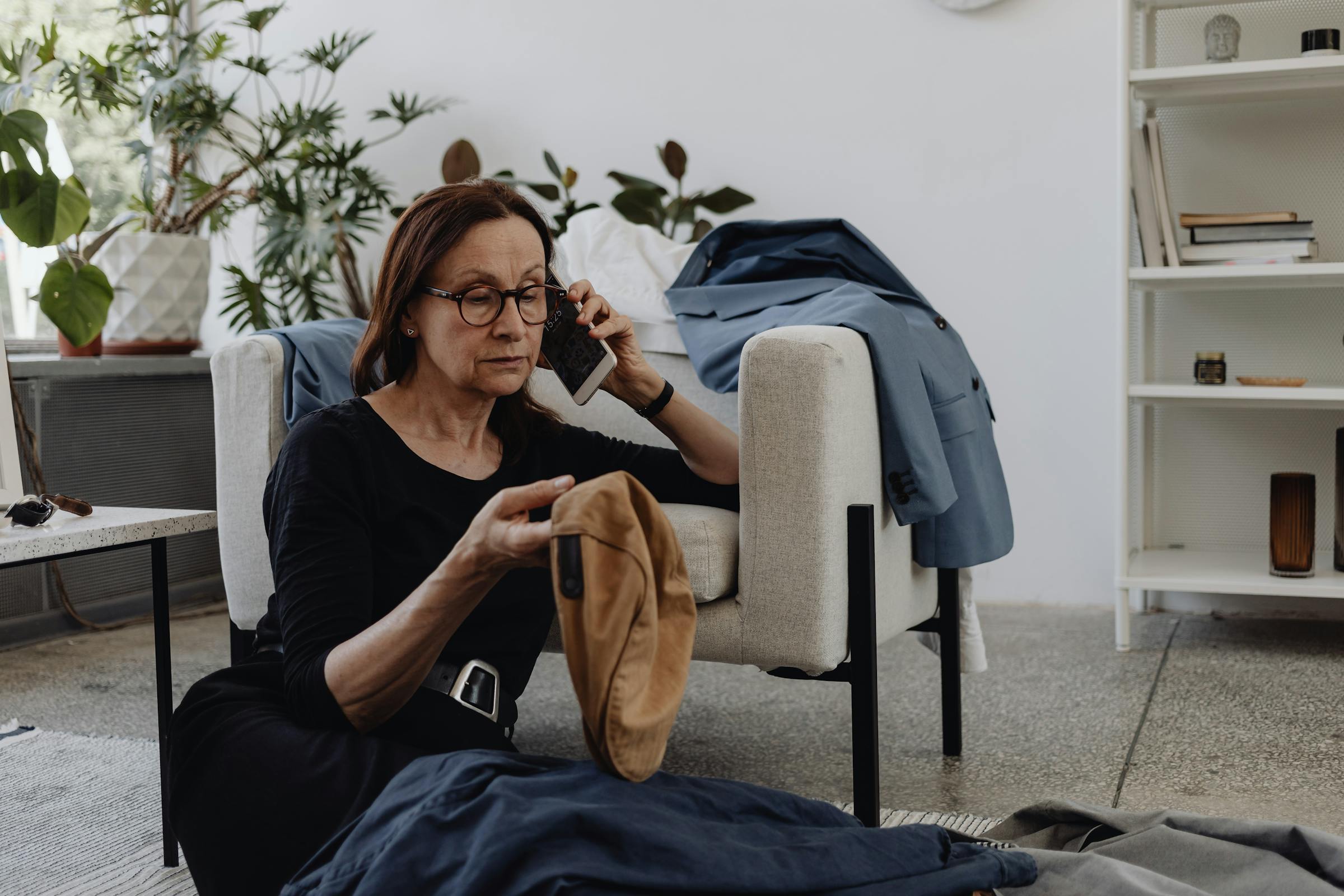 An older woman on a phone call with a serious face | Source: Pexels