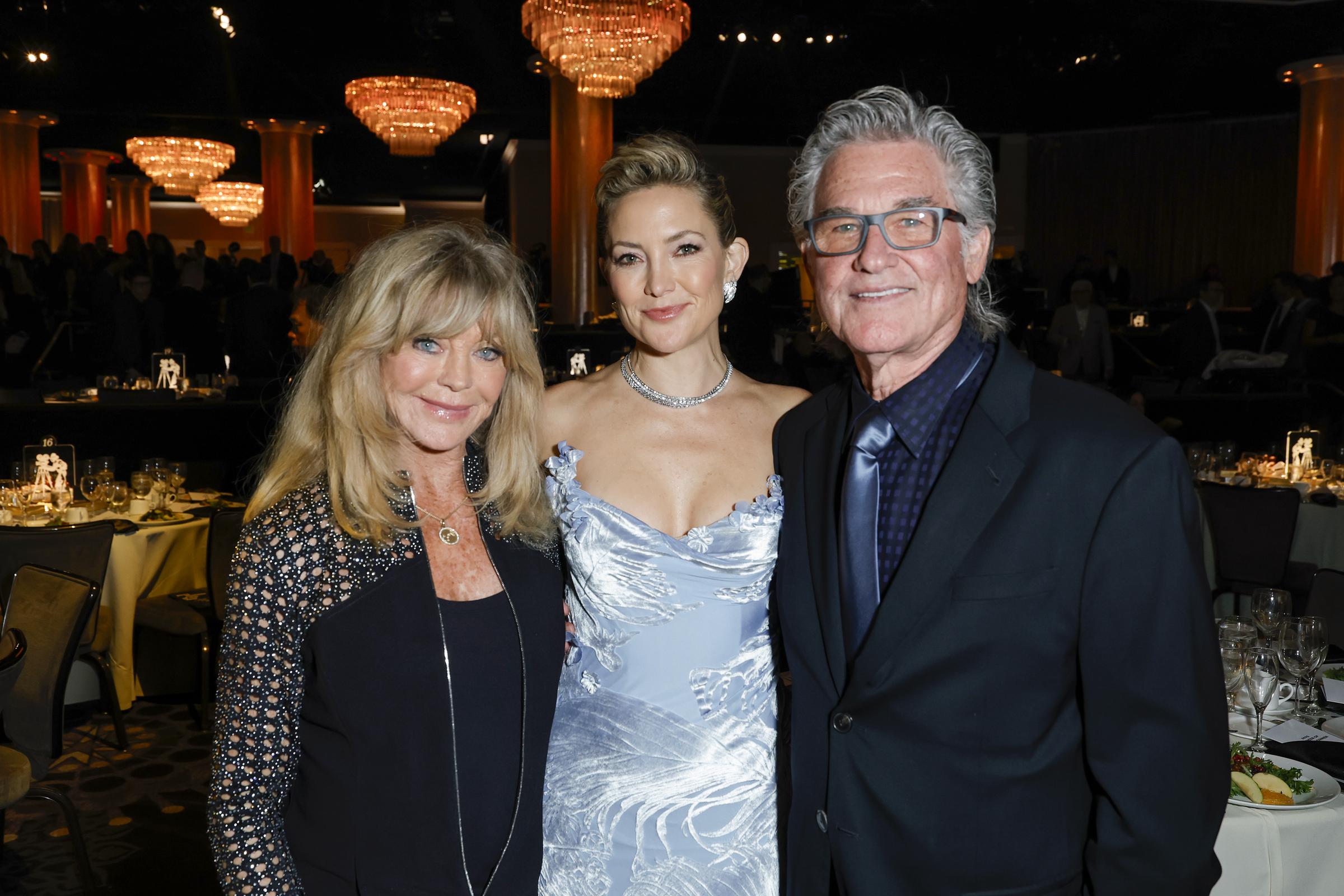 Goldie Hawn, Kate Hudson and Kurt Russell attend Will Rogers Motion Picture Pioneers Foundation's Pioneer Dinner honoring Kate Hudson at The Beverly Hilton on October 08, 2025 in Beverly Hills, California. | Source: Getty Images