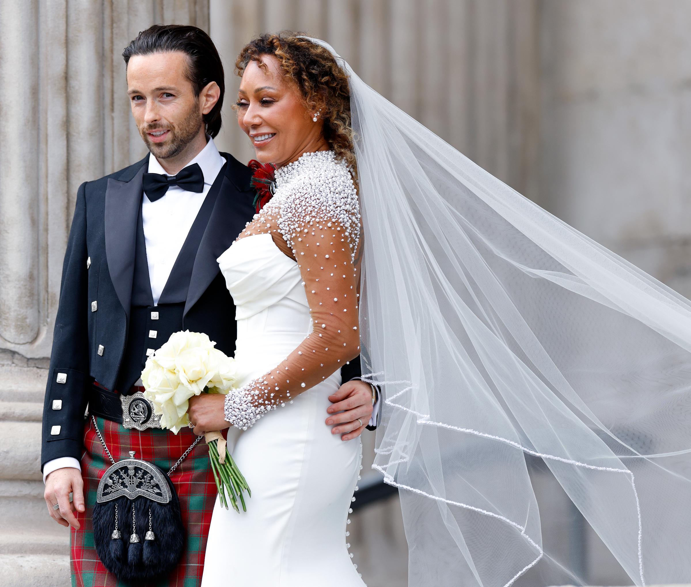 Rory McPhee and Mel B depart following their wedding in the OBE (Order of the British Empire) Chapel at St Paul's Cathedral on July 5, 2025, in London, England. | Source: Getty Images