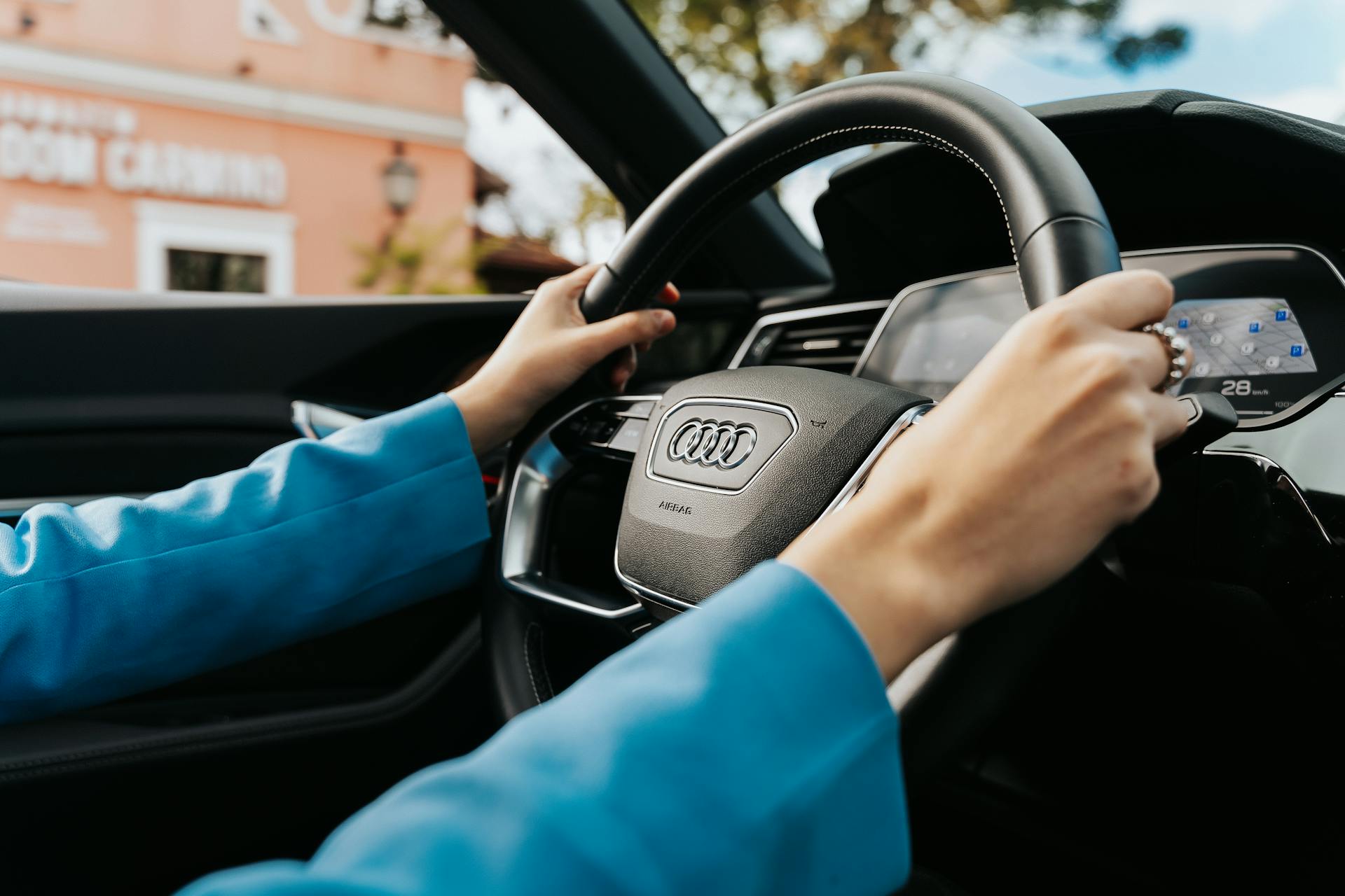 A woman driving a car | Source: Pexels