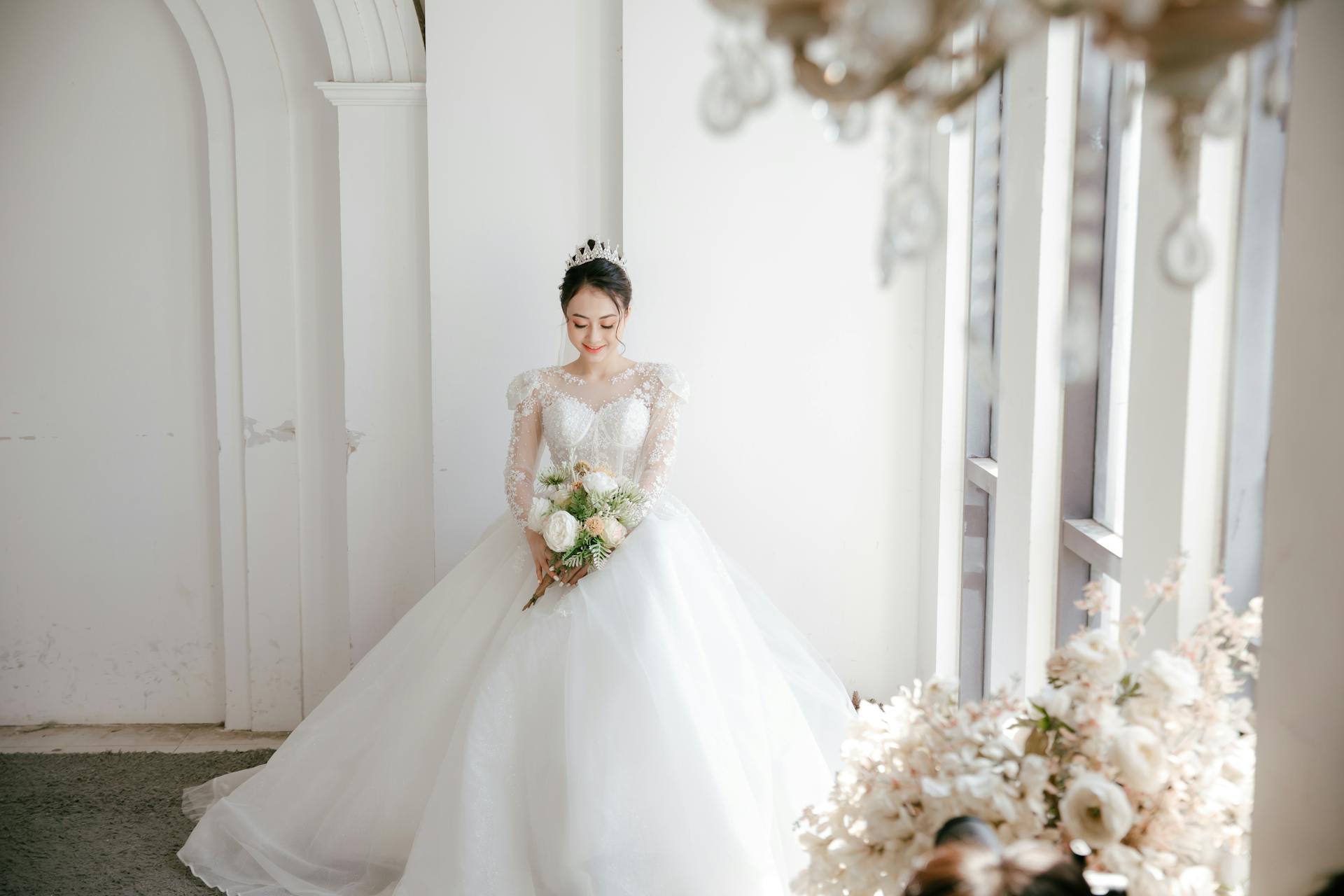 A delighted bride in a gorgeous wedding gown | Source: Pexels