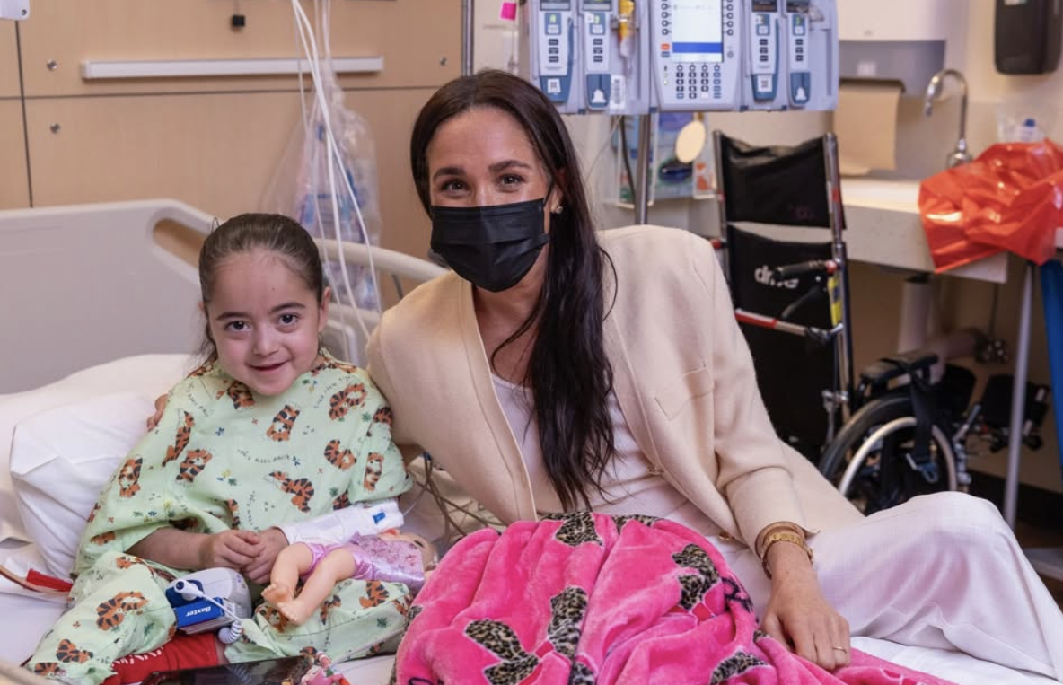 Duchess Meghan with a patient at the Children's Hospital Los Angeles on March 12, 2026. | Source: Instagram/childrensla