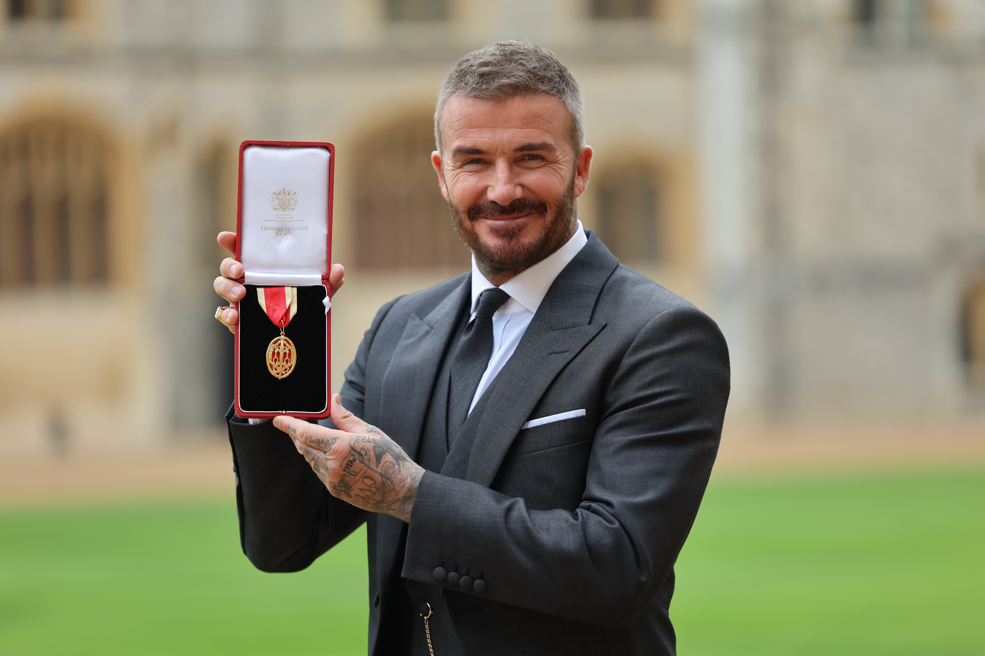 Sir David Beckham poses after he was made a Knight Bachelor at an investiture ceremony at Windsor Castle on November 4, 2025, in Windsor, England. | Source: GEtty Images