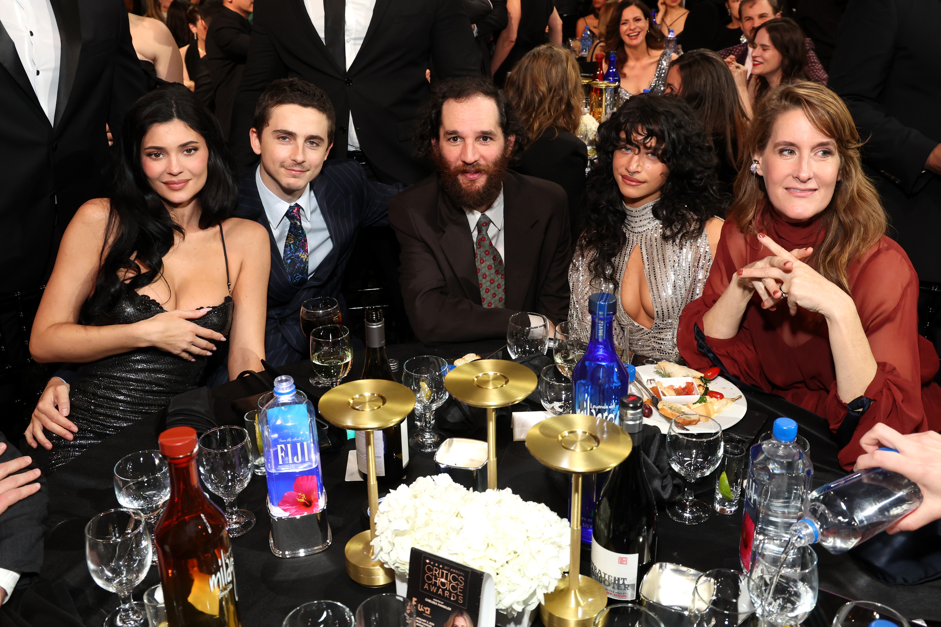 Kylie Jenner, Timothée Chalamet, Josh Safdie, Odessa A'zion, and Jennifer Venditti attend FIJI Water At The 31st Annual Critics Choice Awards at Barker Hangar on January 04, 2026 in Santa Monica, California. | Source: Getty Images