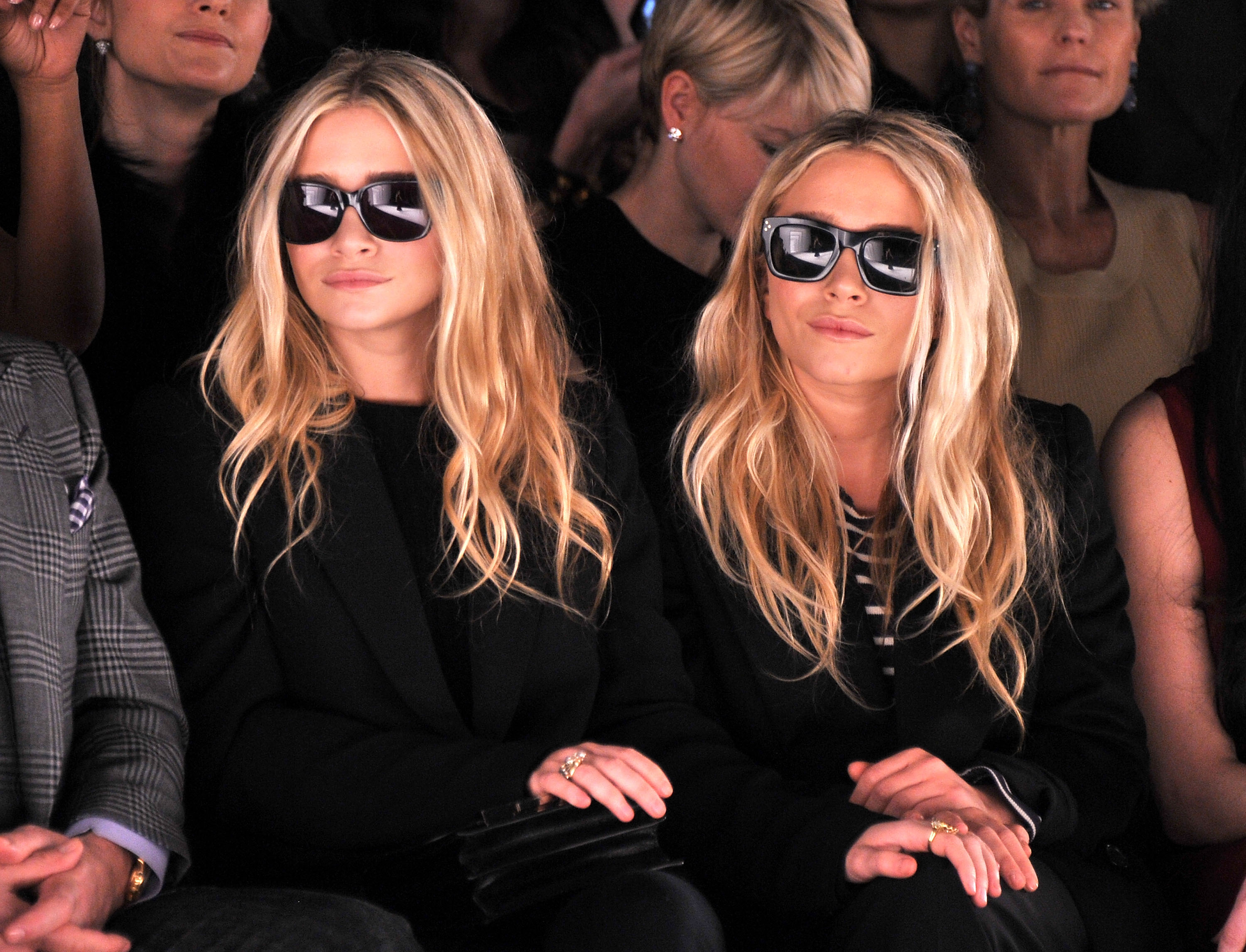 Ashley and Mary-Kate Olsen attend the J. Mendel Fall fashion show during Mercedes-Benz Fashion Week in New York City on February 15, 2012 | Source: Getty Images