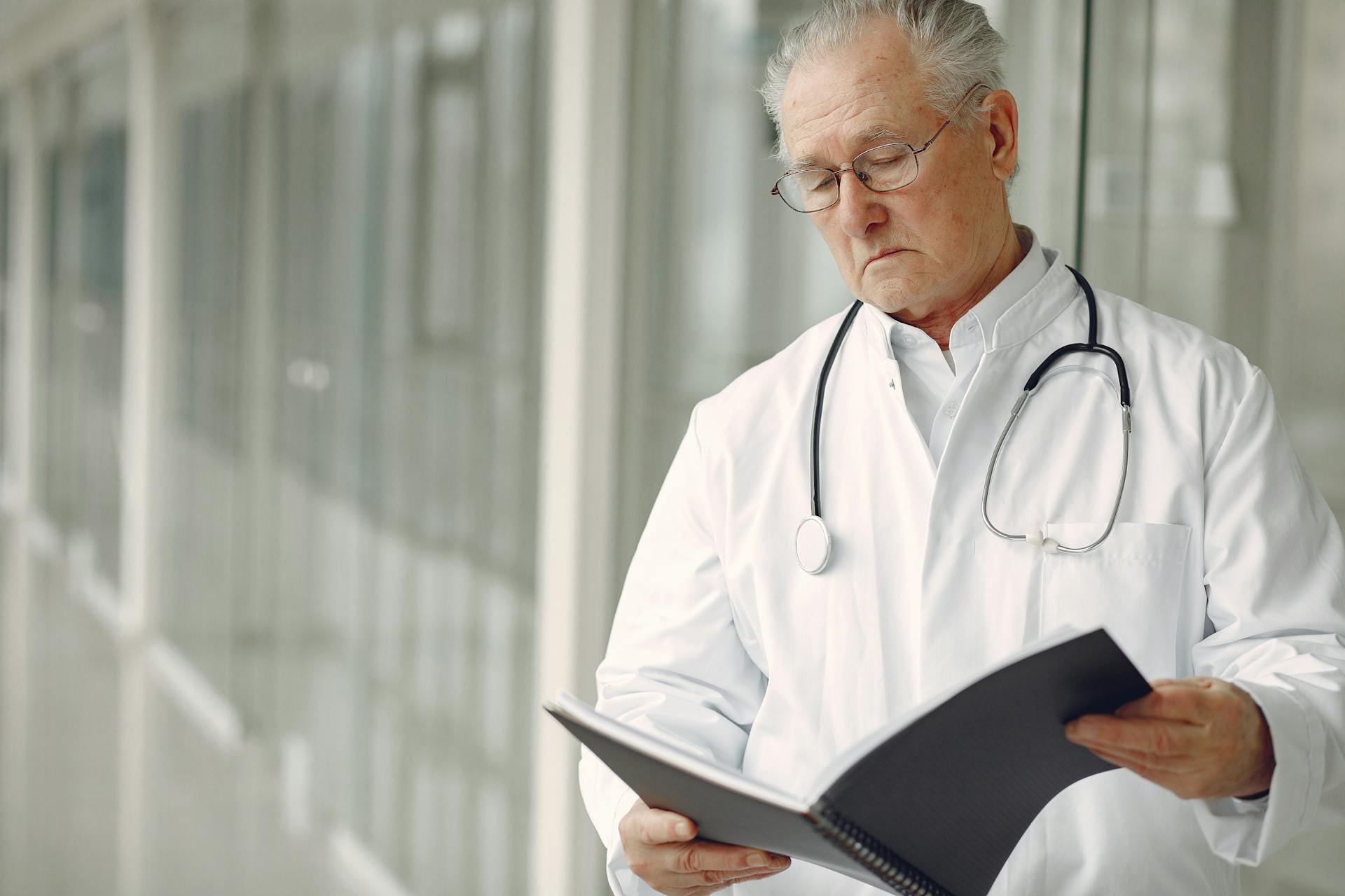 A doctor looking at a report | Source: Pexels