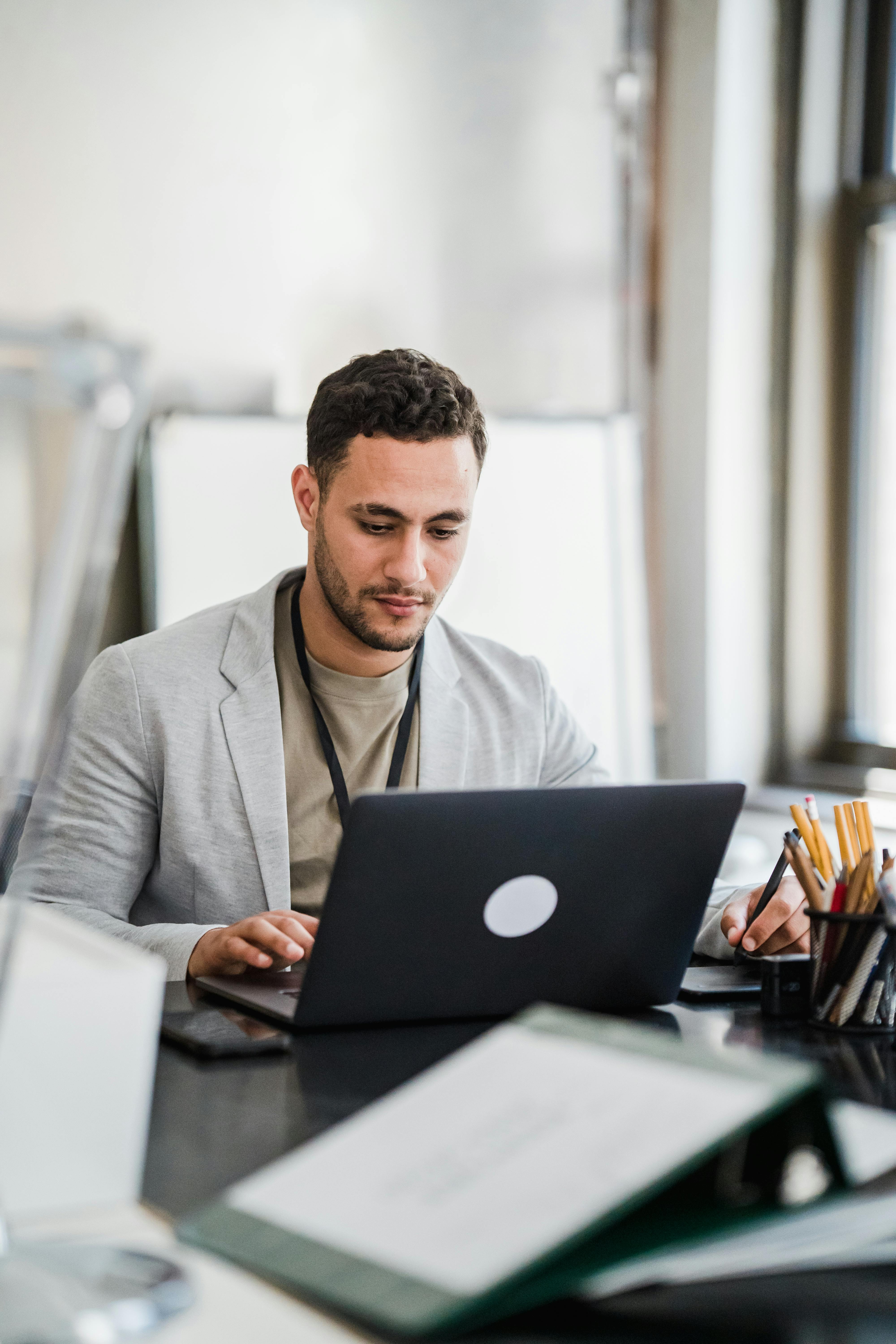 A man working on a laptop | Source: Pexels