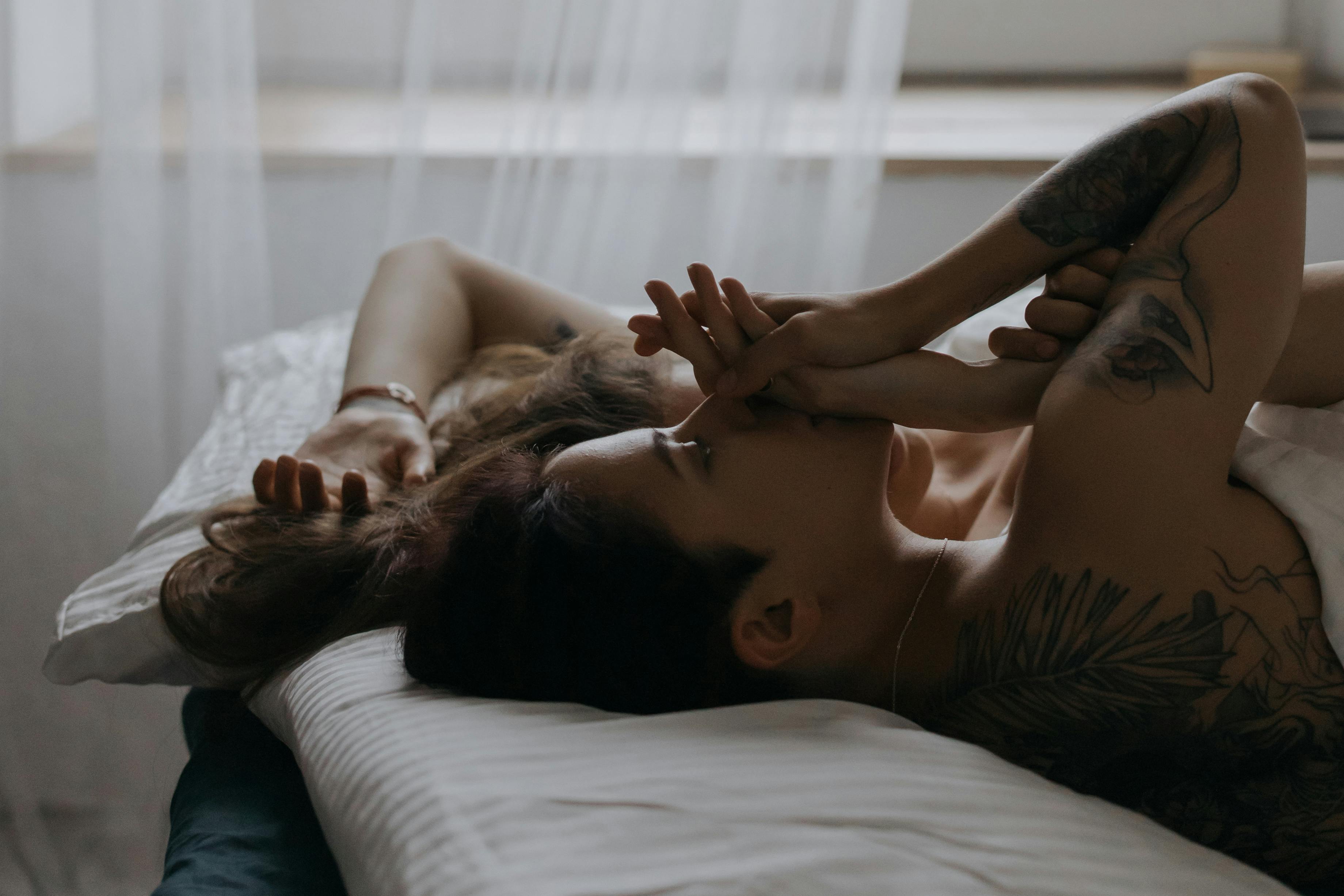 Couple in bed | Source: Pexels