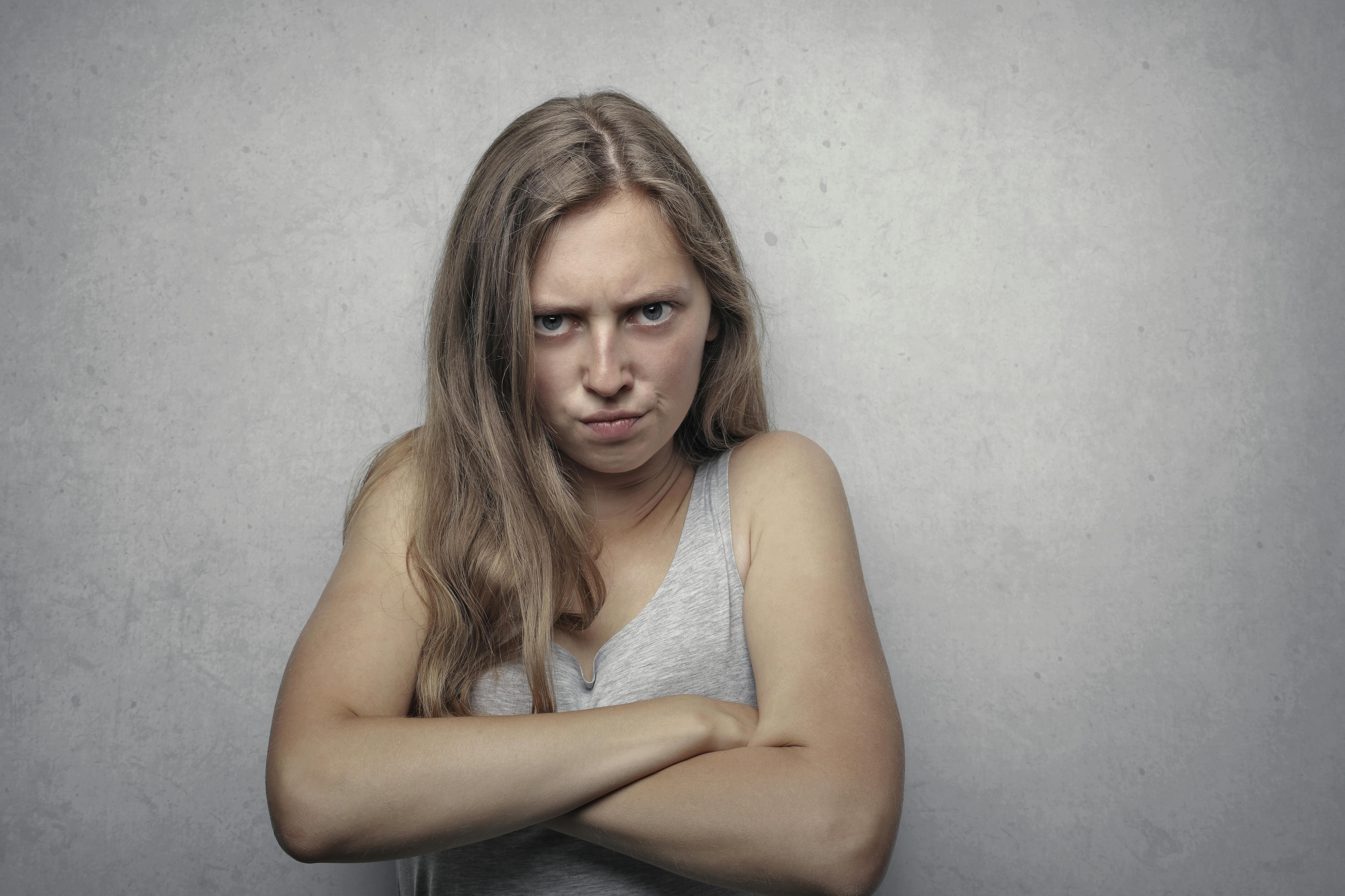 An annoyed woman with her arms crossed | Source: Pexels