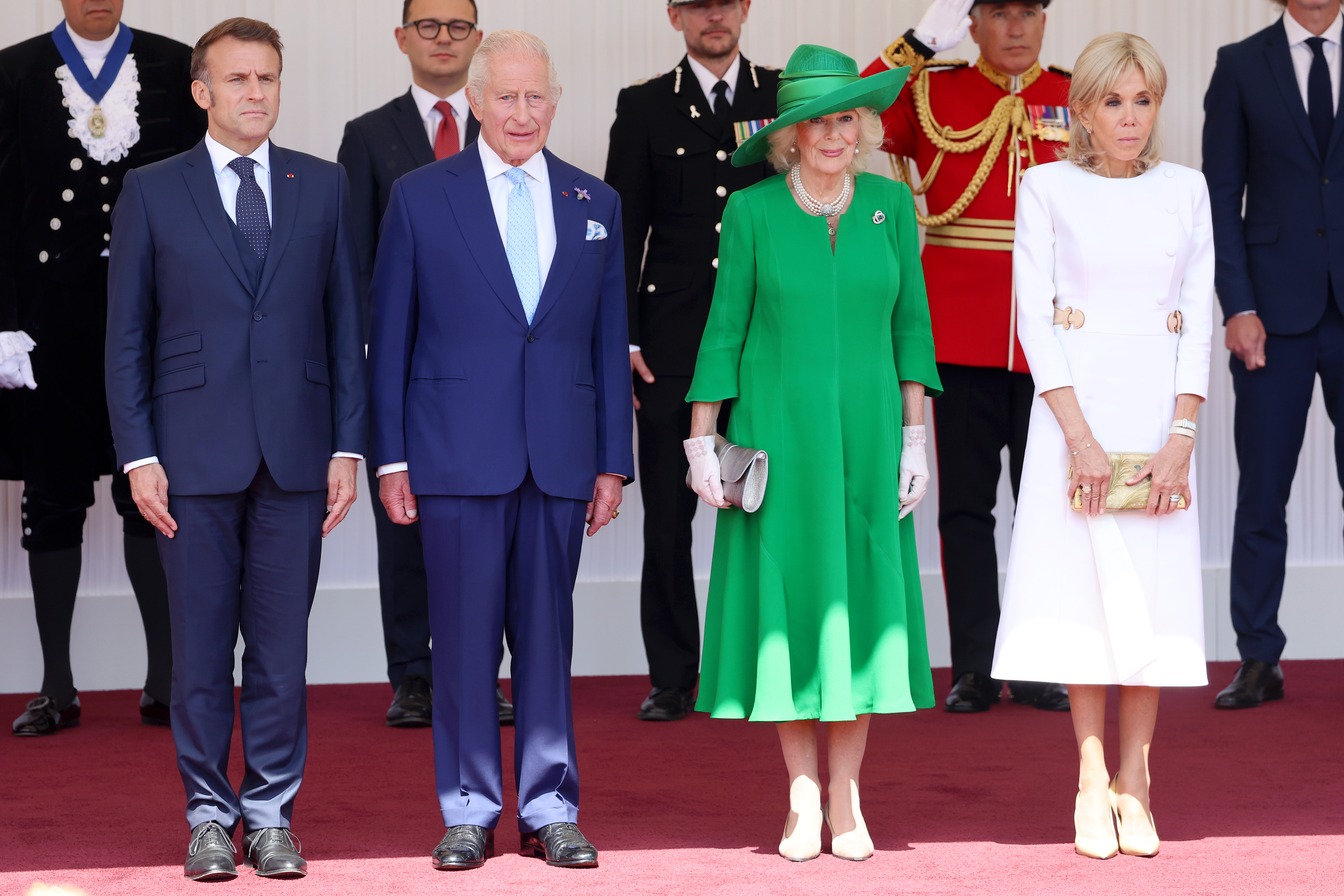 President of France, Emmanuel Macron, King Charles III, Queen Camilla and Brigitte Macron on the Royal Dais at Datchet Road on July 8, 2025, in Windsor, England. | Source: Getty Images