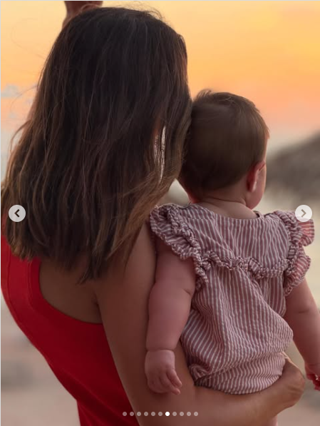 A backshot of Mandy Moore posing with her 10-month old baby while on vacation in Mexico from a post dated July 30, 2025 | Source: Instagram/mandymoore